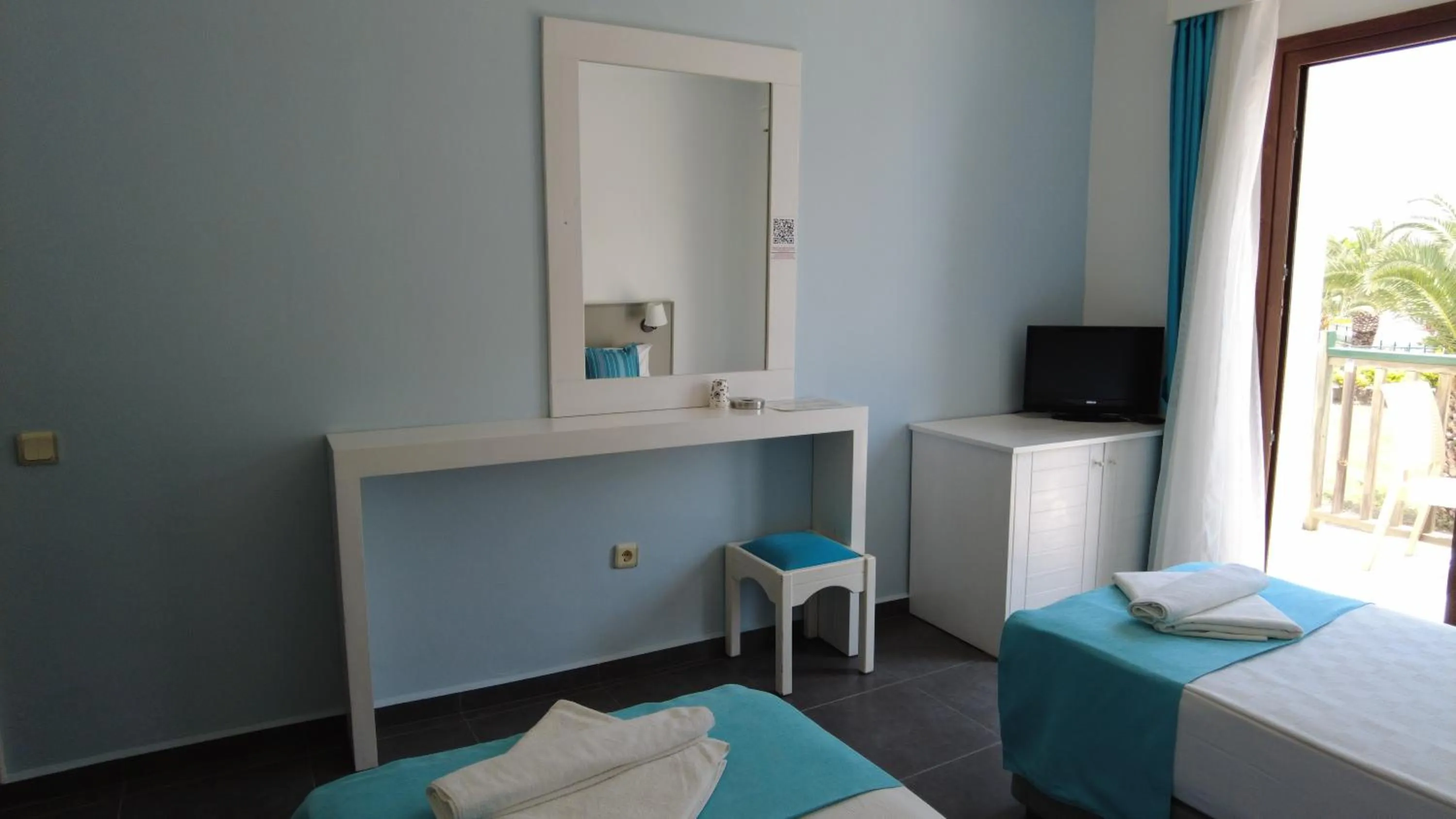 Bed in Gumbet Cove Hotel