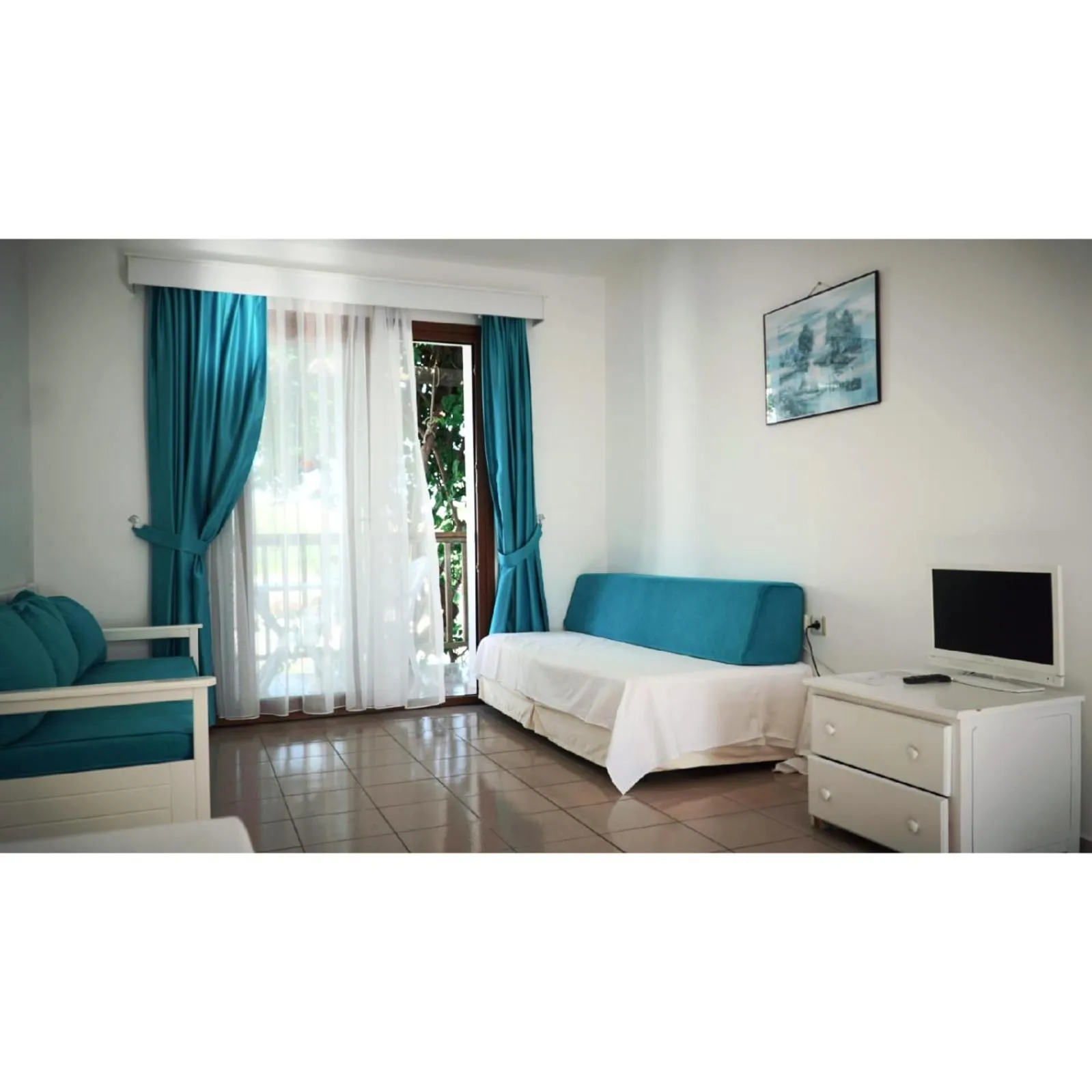 Bed in Gumbet Cove Hotel