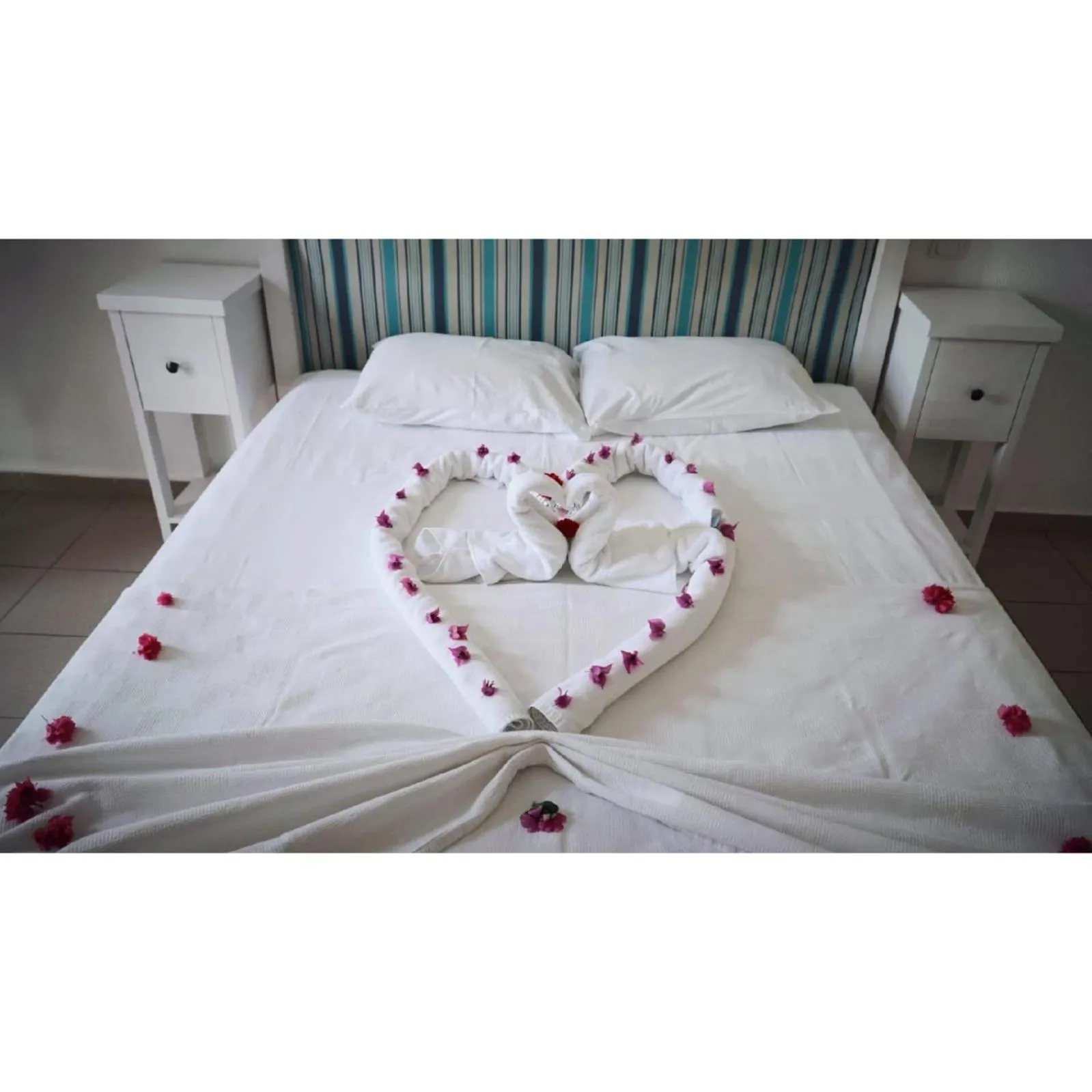 Bed in Gumbet Cove Hotel