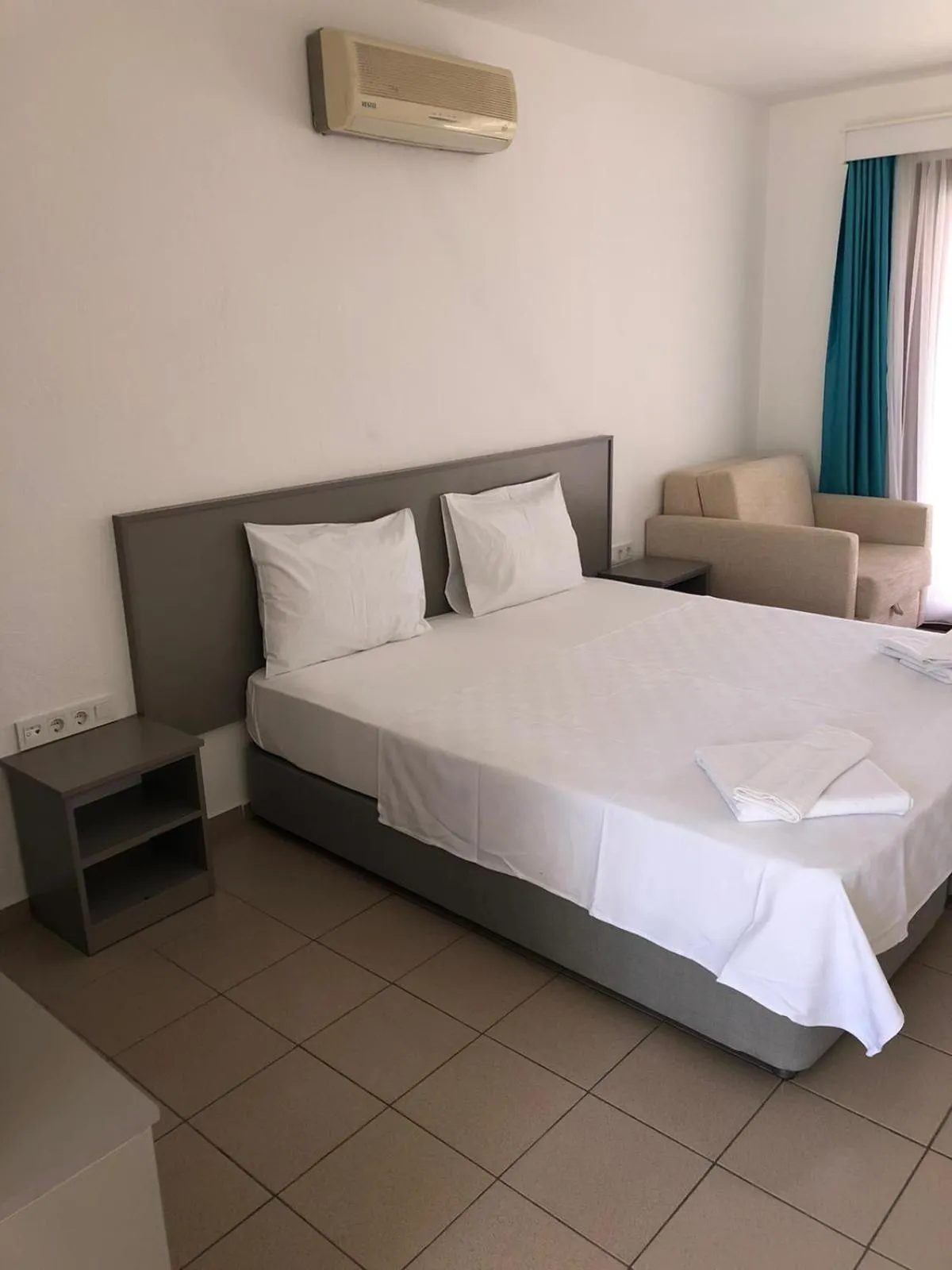 Bed in Gumbet Cove Hotel