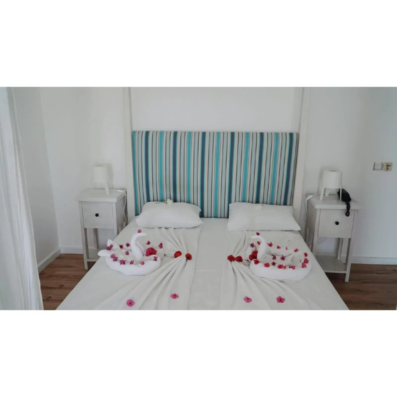 Bed in Gumbet Cove Hotel