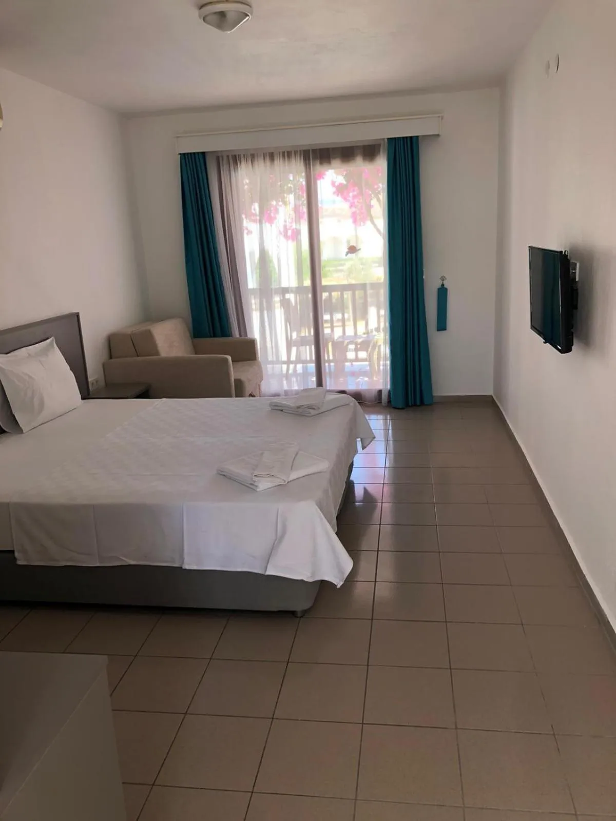 Bed in Gumbet Cove Hotel