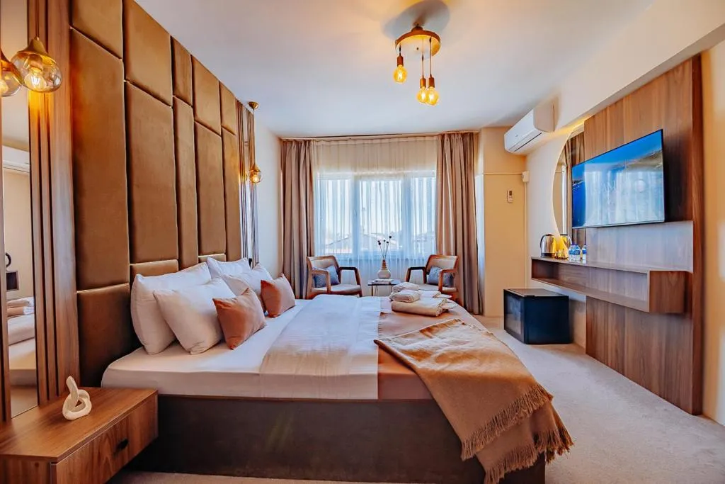 Bed in Ali Khan Hotel