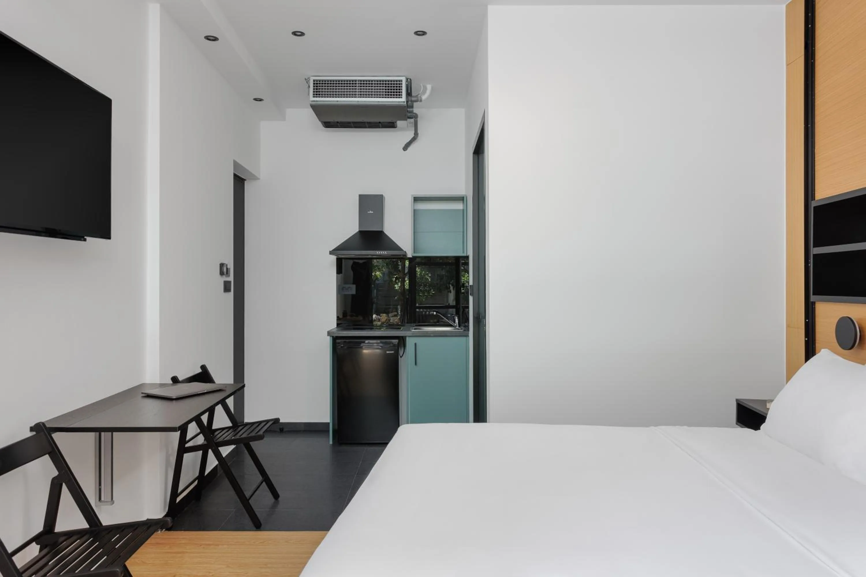 Photo of the whole room, Bed in THE URBANIST •inner city residences•