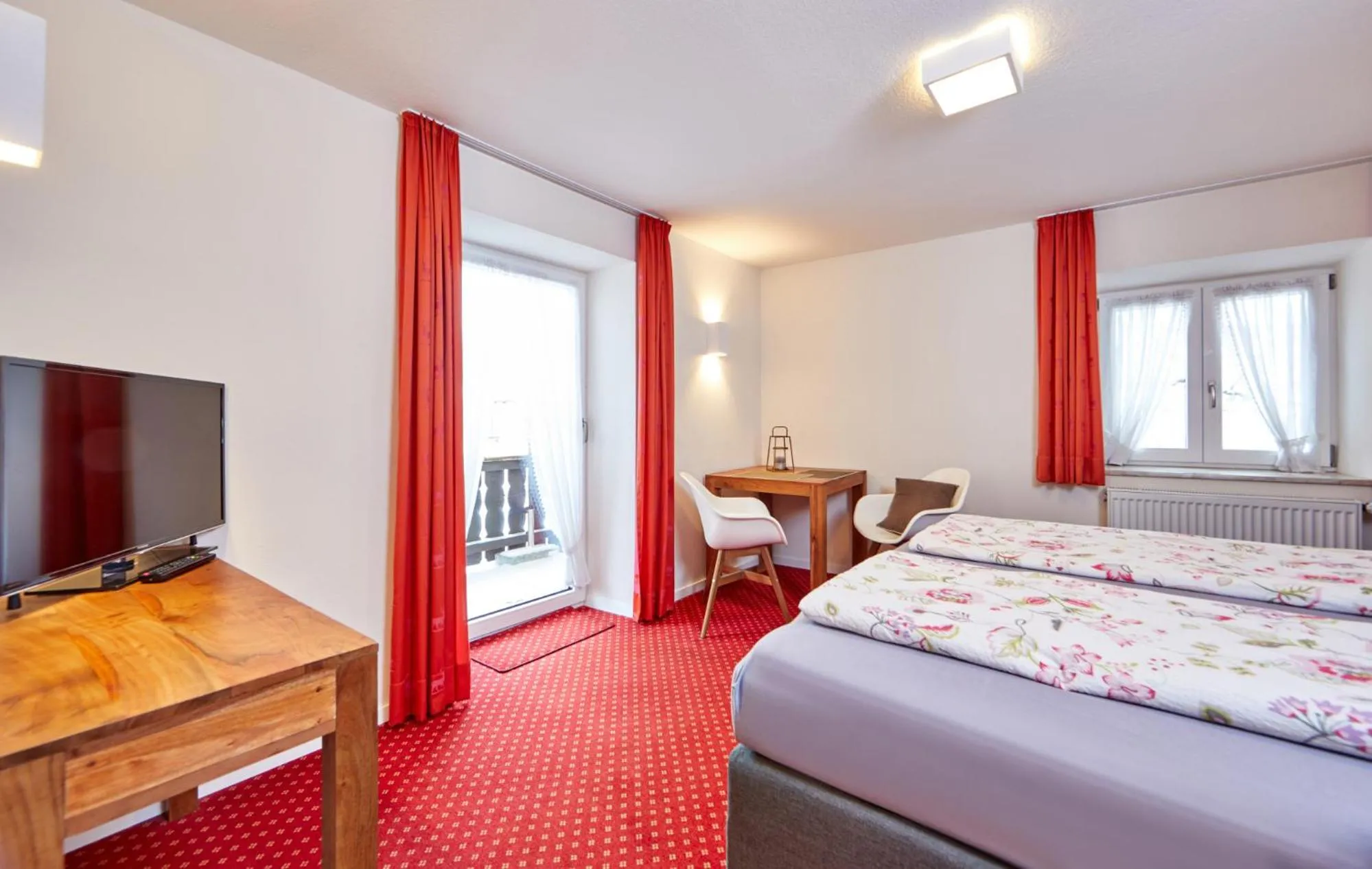 Seating area, Bed in Alpen Gästehaus