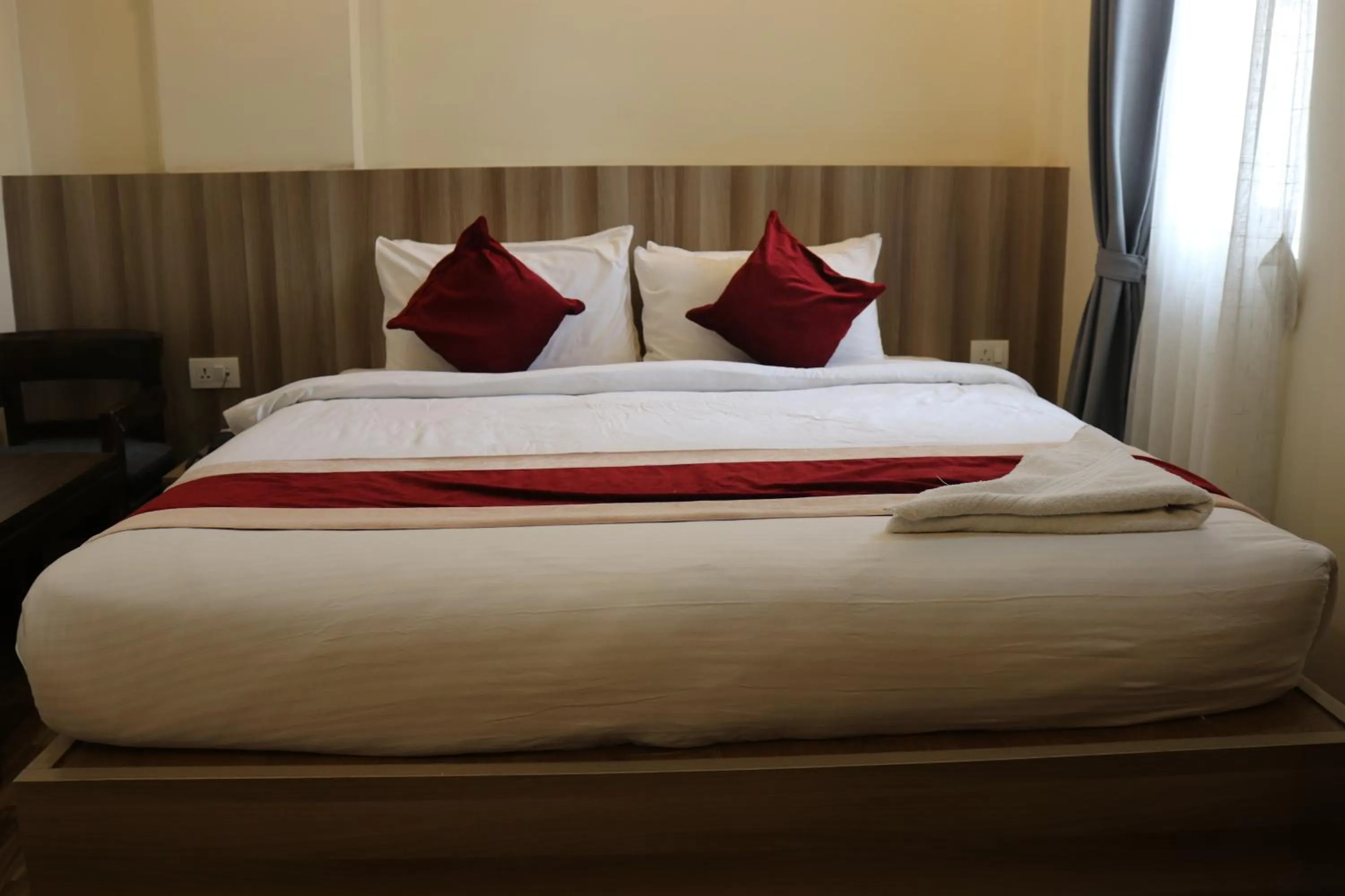 Bed in Hotel Royal Emperor