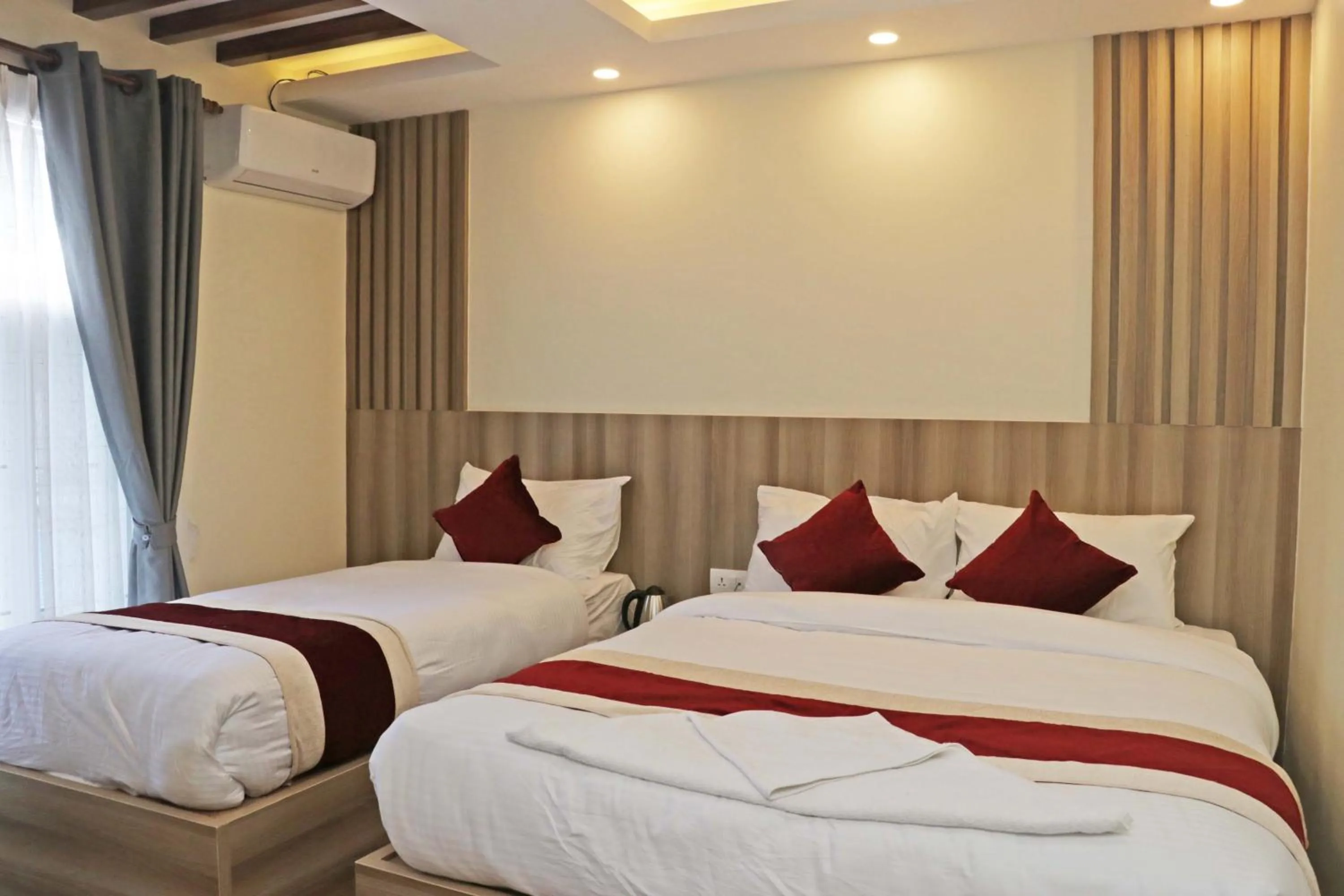 Bed in Hotel Royal Emperor