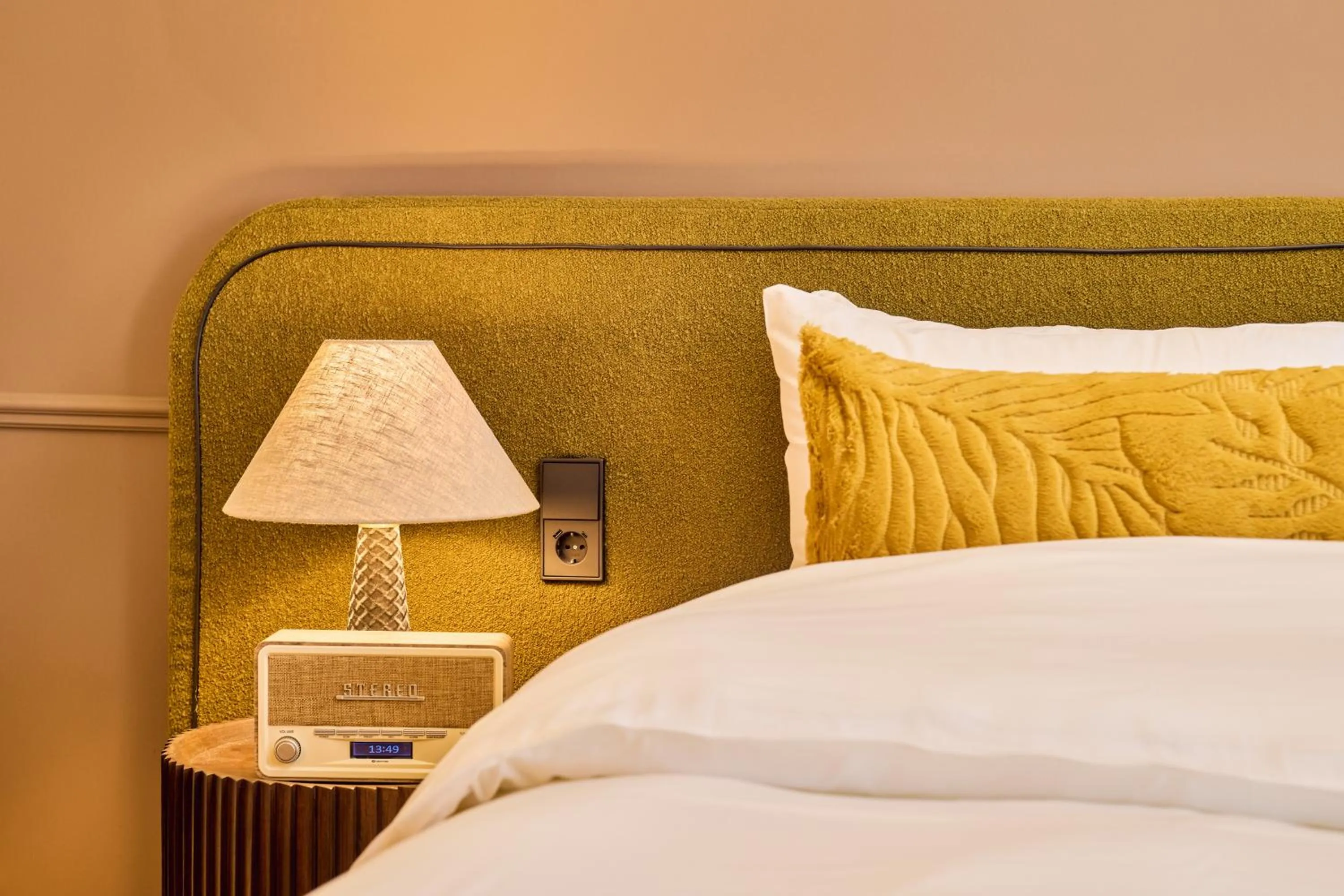 Bed in ARQ Paleis Hotel