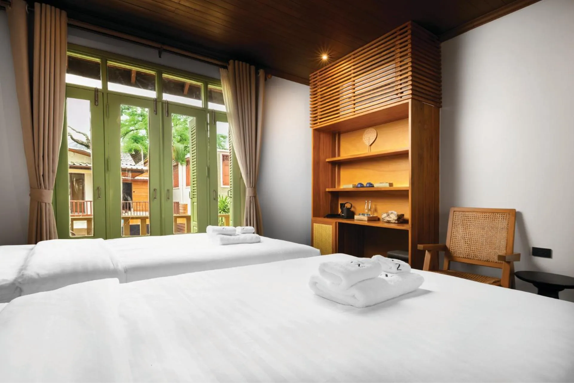 Bed in Nava Luang Prabang Hotel