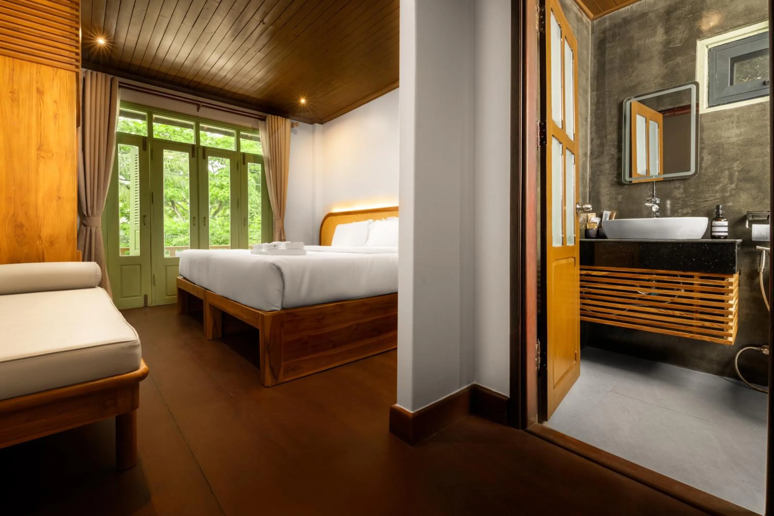 Photo of the whole room, Bed in Nava Luang Prabang Hotel