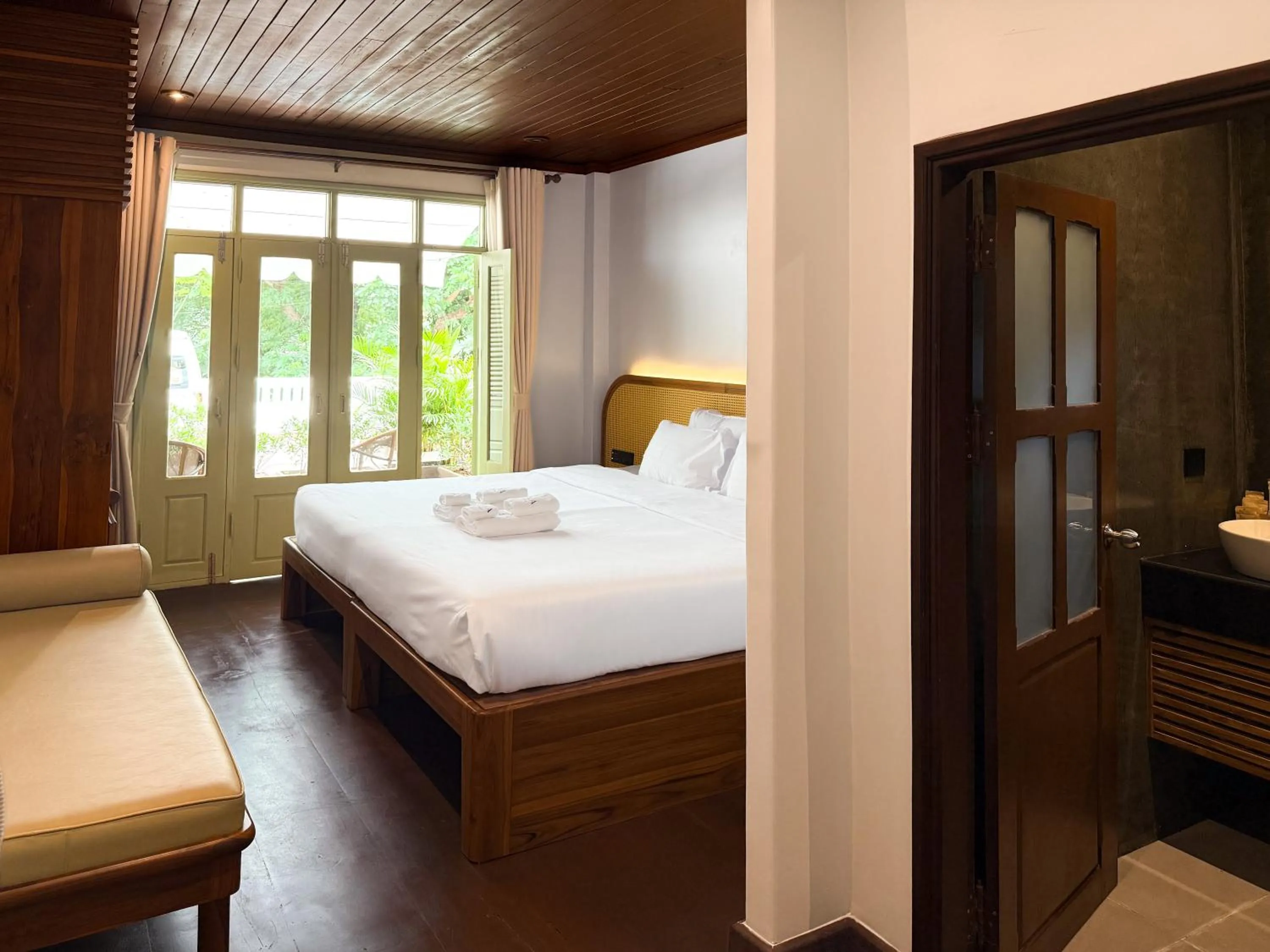 Bathroom, Bed in Nava Luang Prabang Hotel