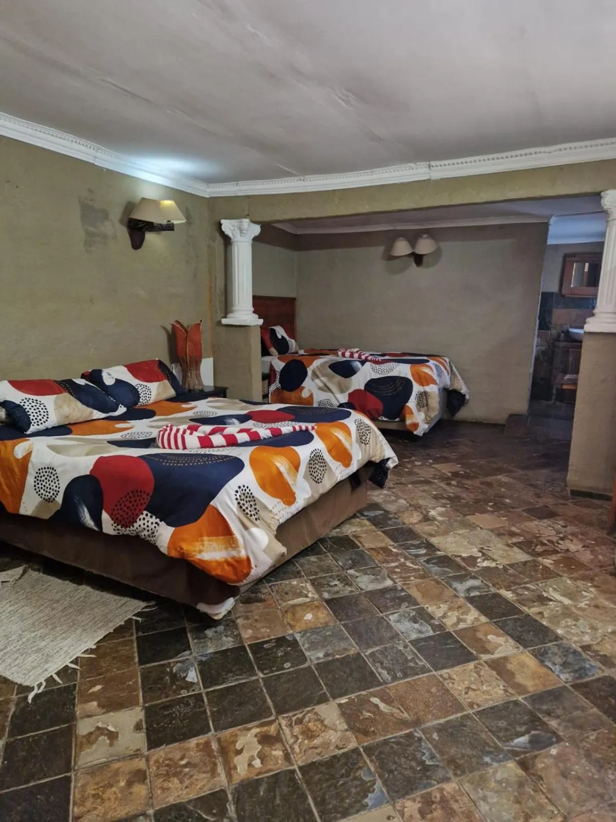 Bed in Emahlathini Guest Farm