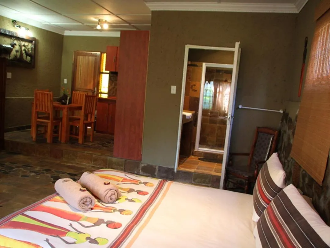 Bed in Emahlathini Guest Farm