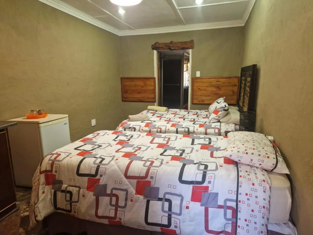 Bed in Emahlathini Guest Farm