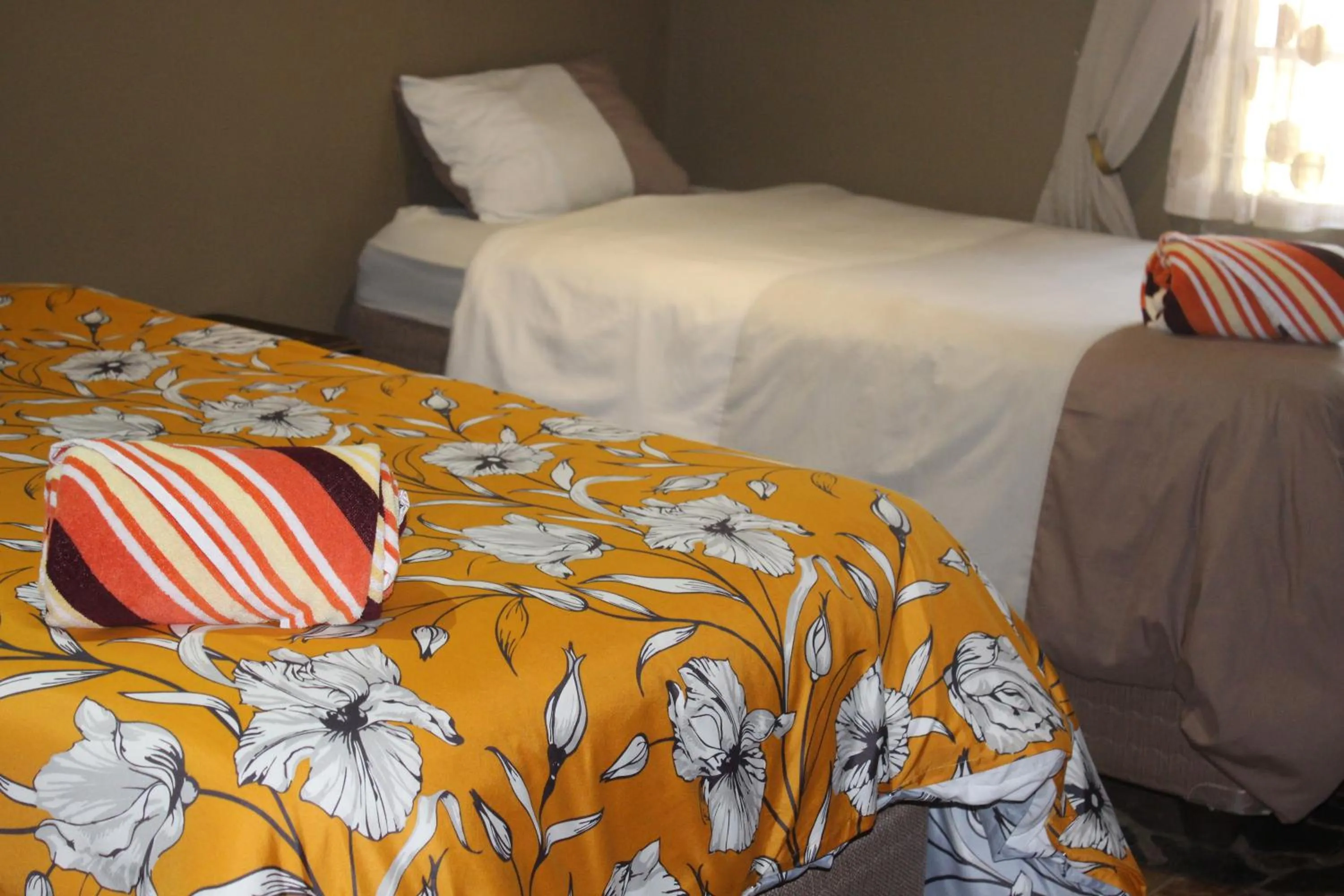 Bed in Emahlathini Guest Farm