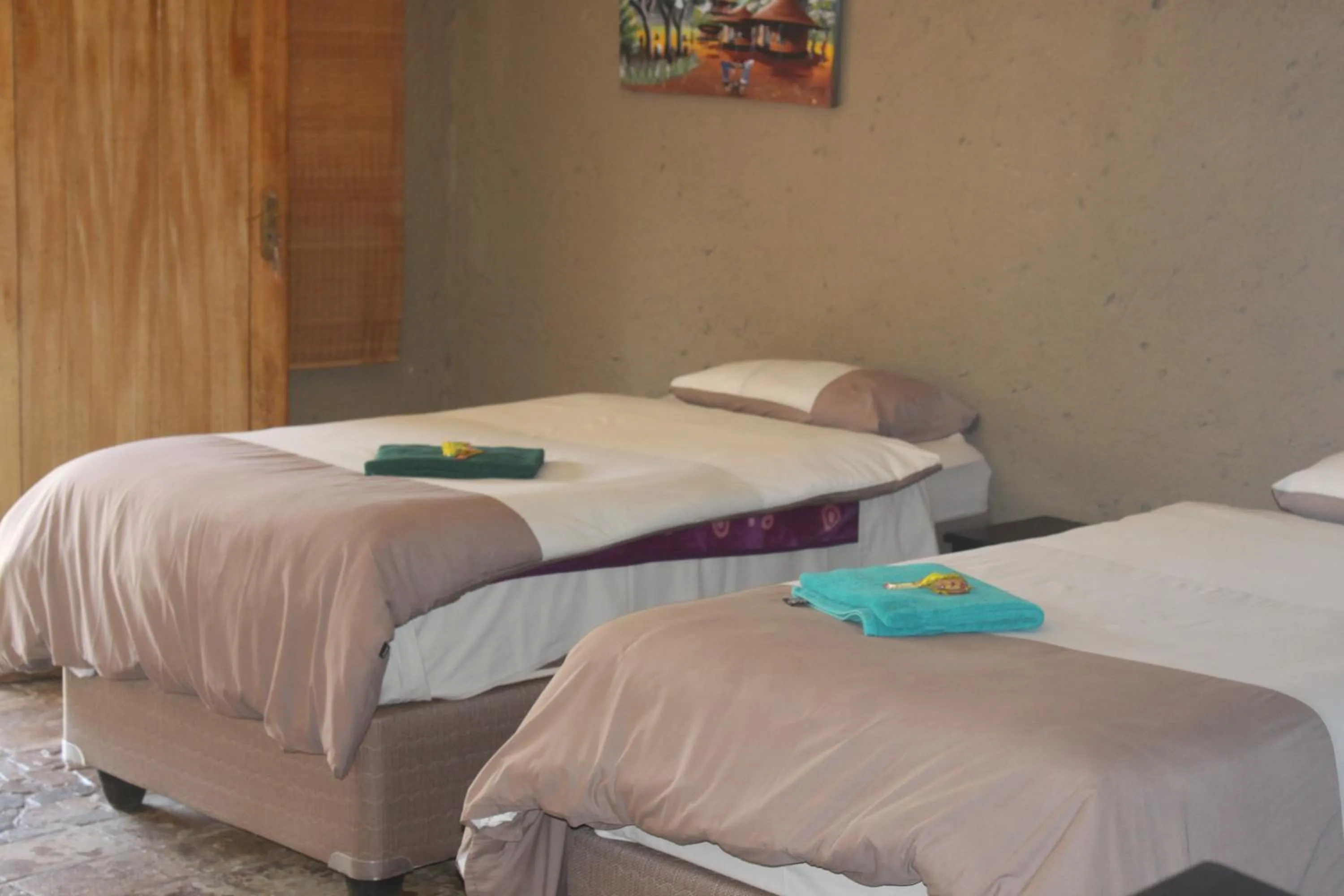 Bed in Emahlathini Guest Farm