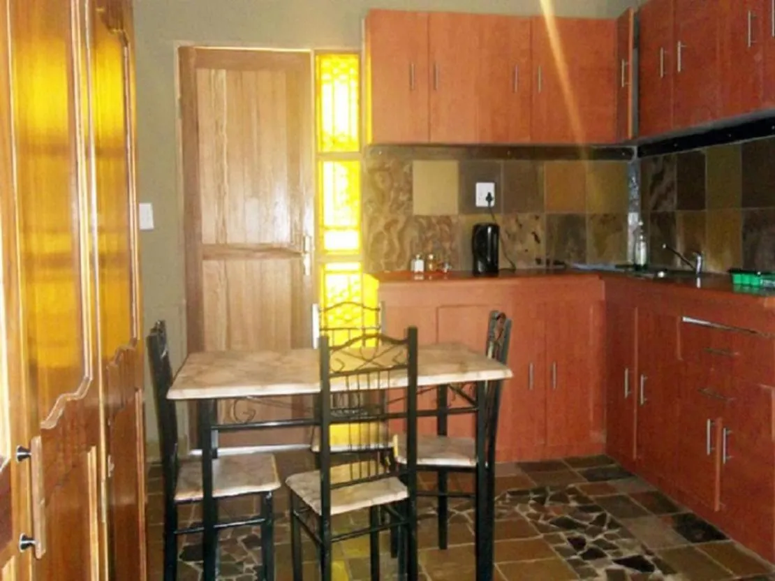 Kitchen or kitchenette in Emahlathini Guest Farm