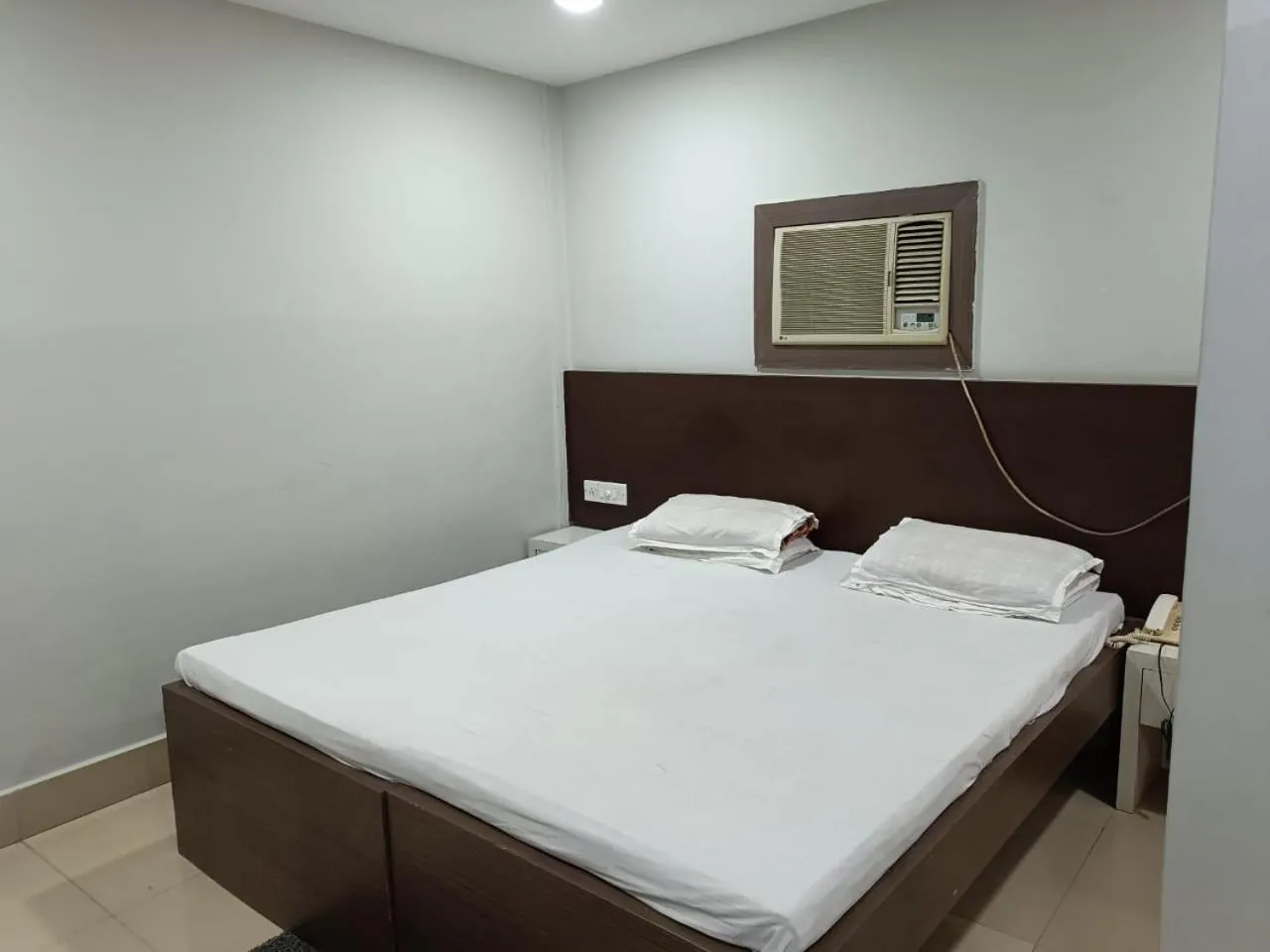 Bed in Kusum Hotel