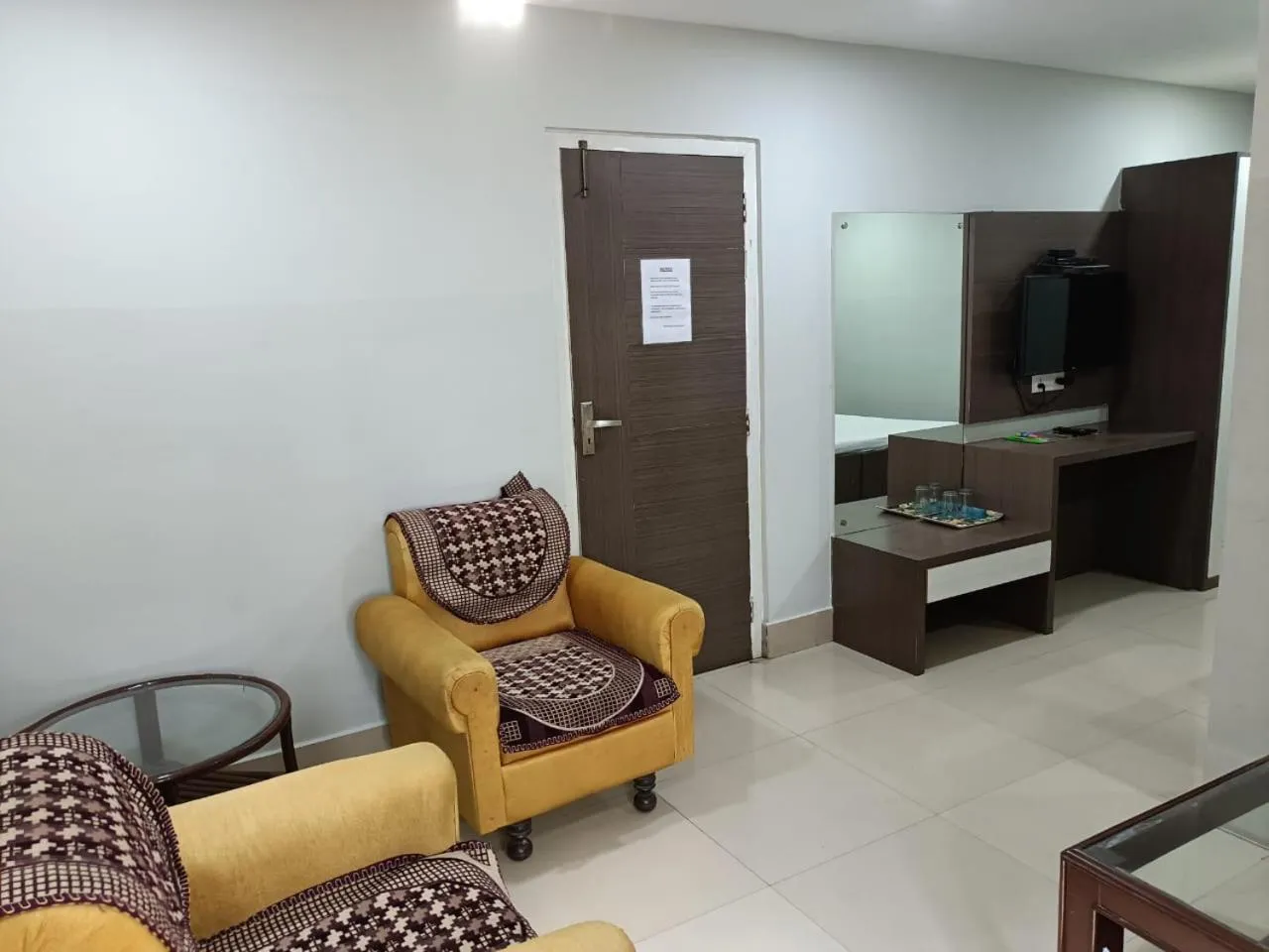 Seating area in Kusum Hotel