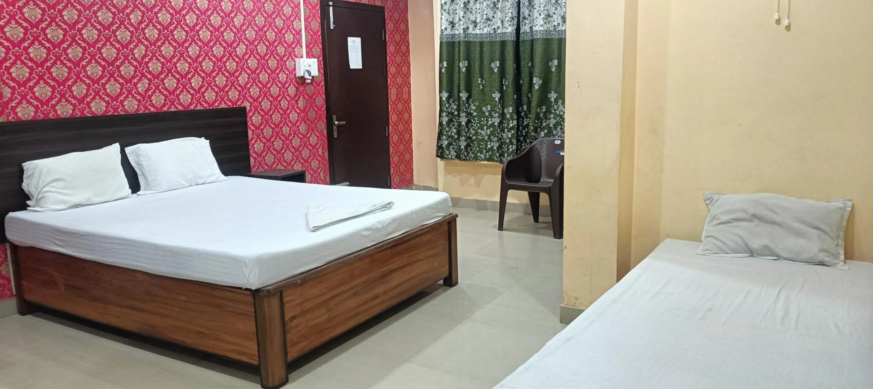 Bed in Kusum Hotel