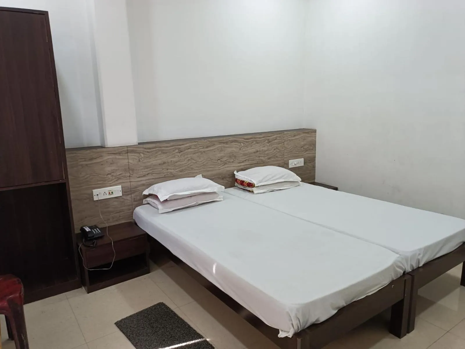 Bed in Kusum Hotel
