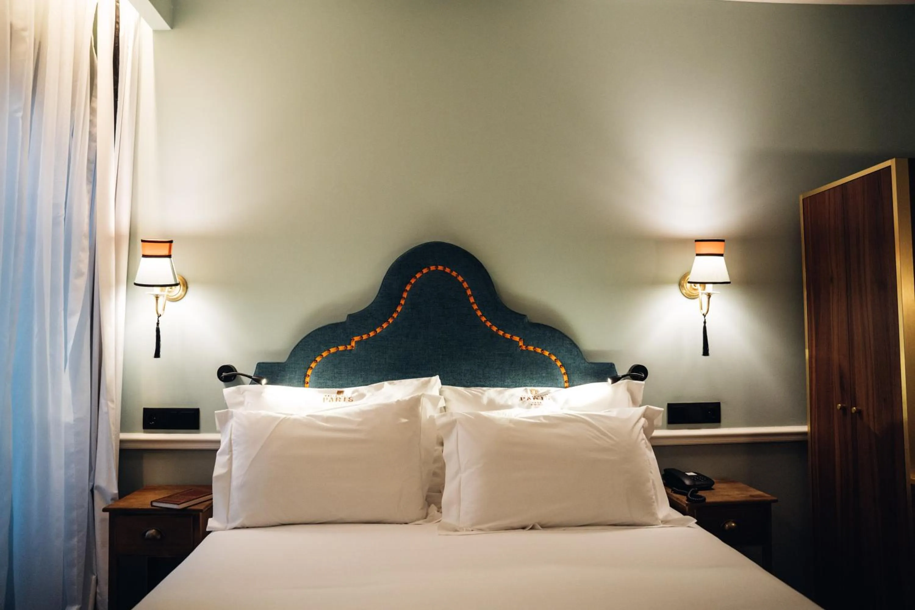 Bed in GRANDE HOTEL PARIS by STAY HOTELS