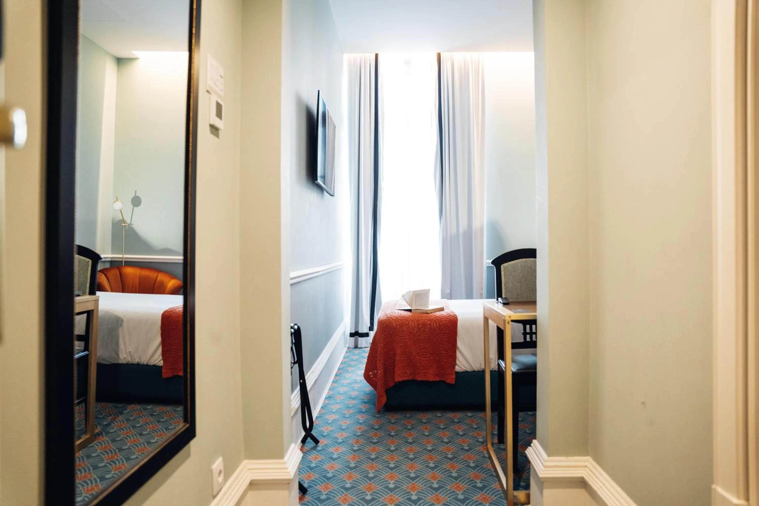 Bed in GRANDE HOTEL PARIS by STAY HOTELS