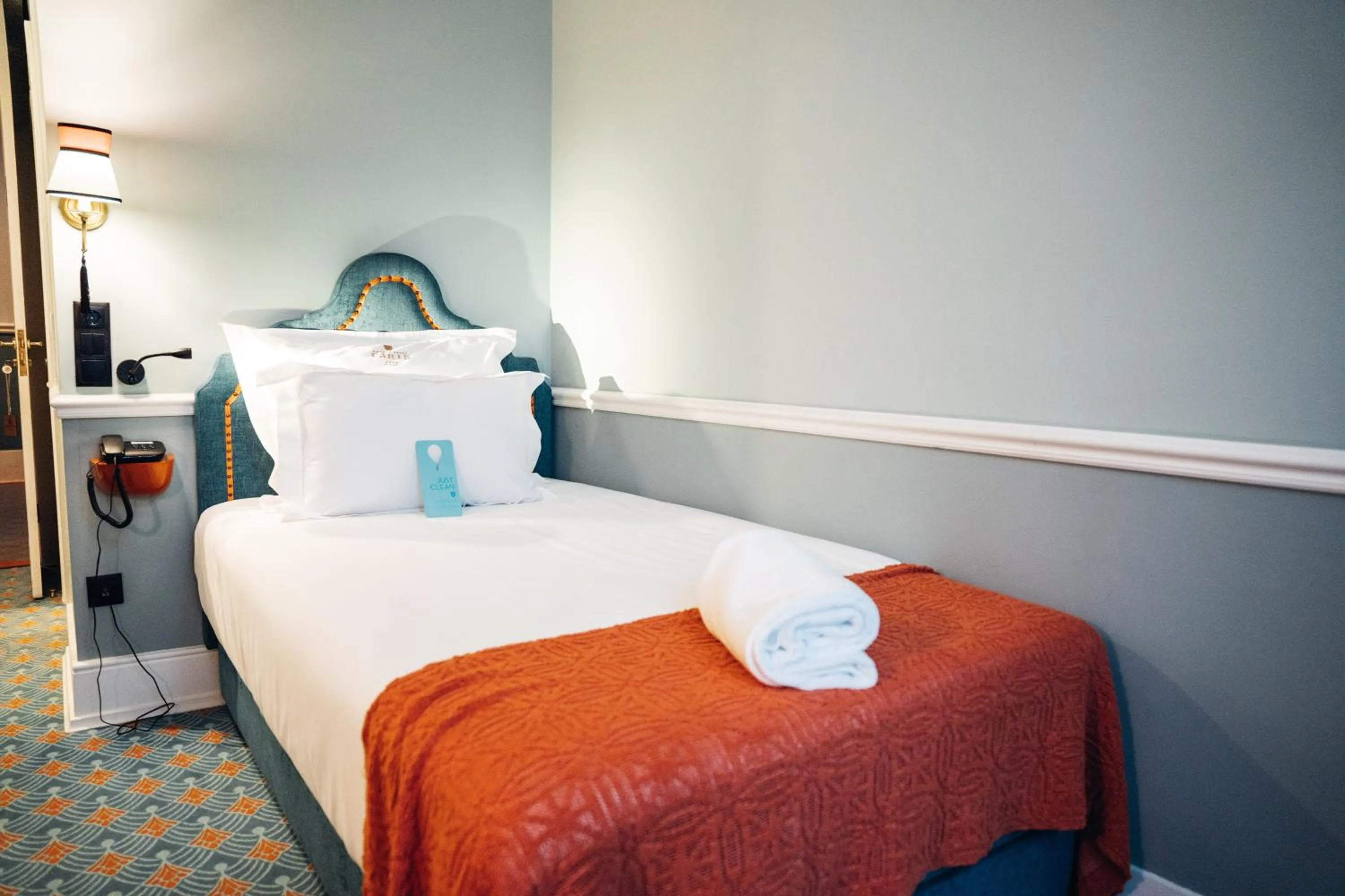 Bed in GRANDE HOTEL PARIS by STAY HOTELS