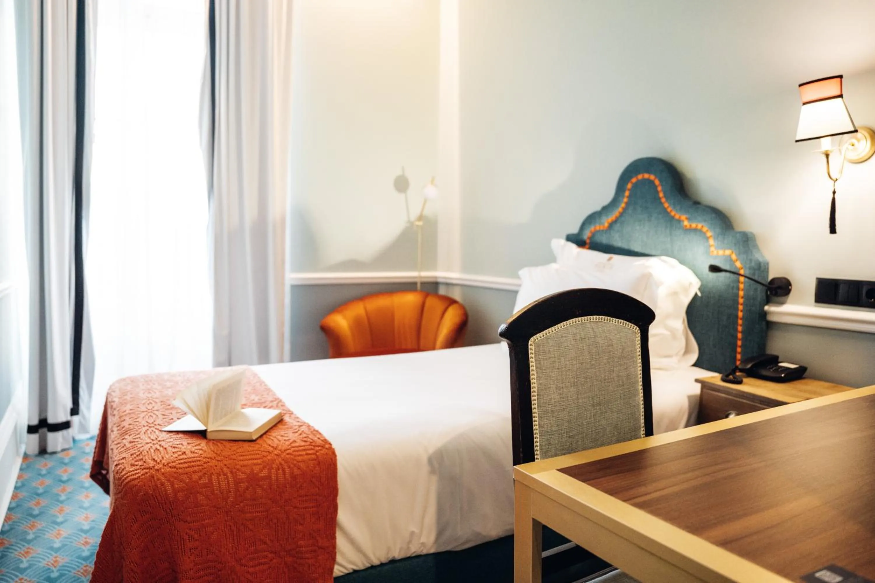Bed in GRANDE HOTEL PARIS by STAY HOTELS