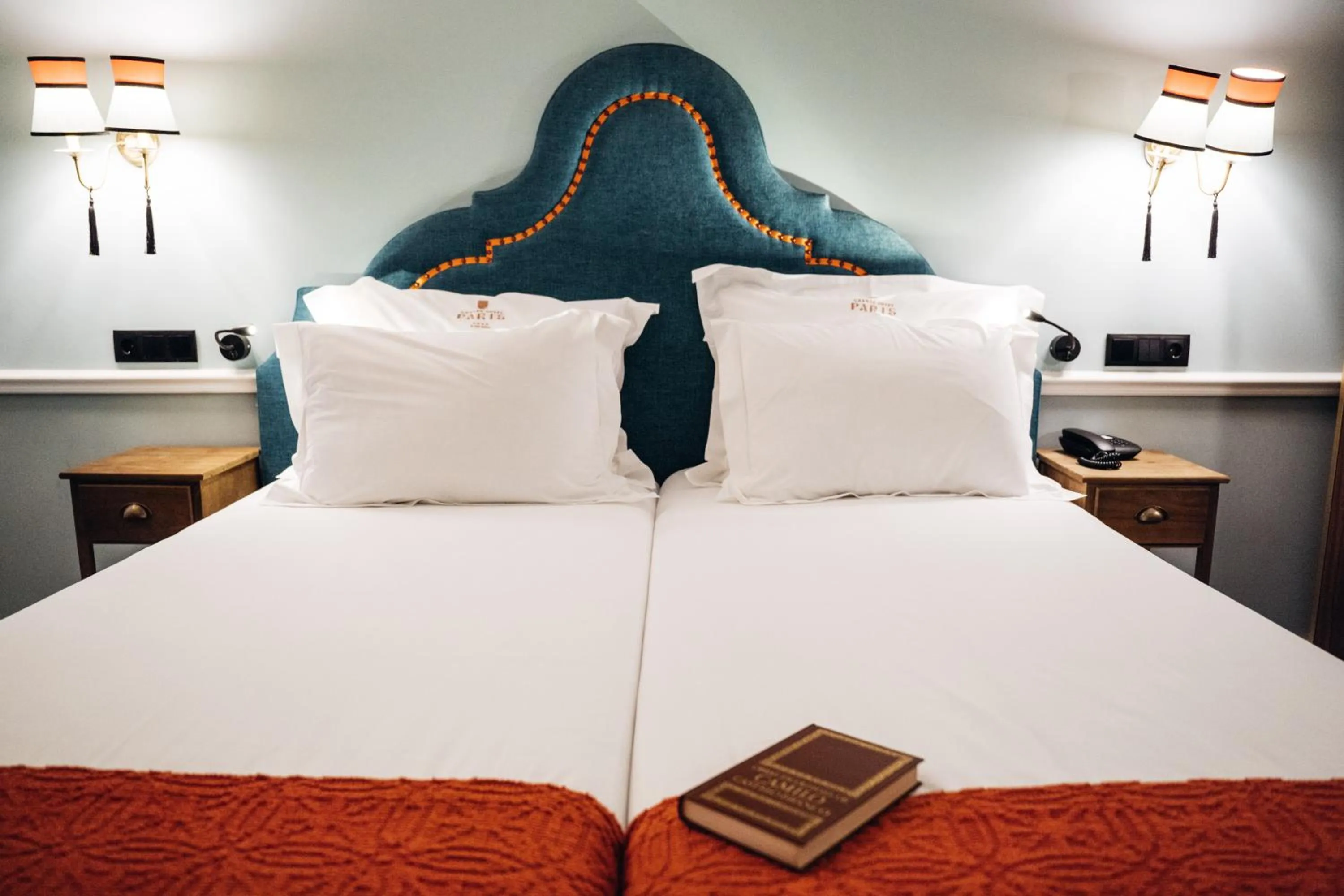 Bed in GRANDE HOTEL PARIS by STAY HOTELS