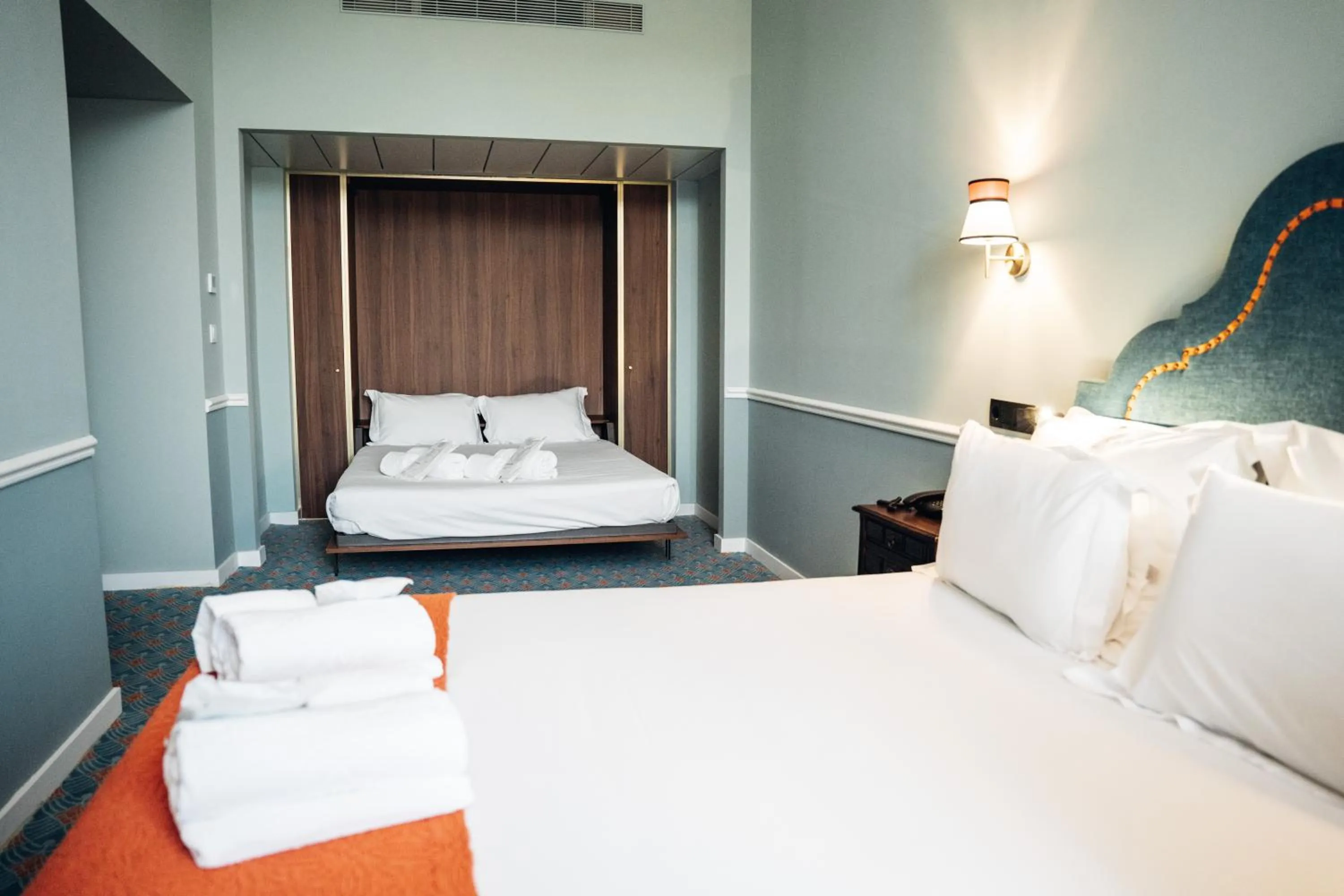 Bed in GRANDE HOTEL PARIS by STAY HOTELS