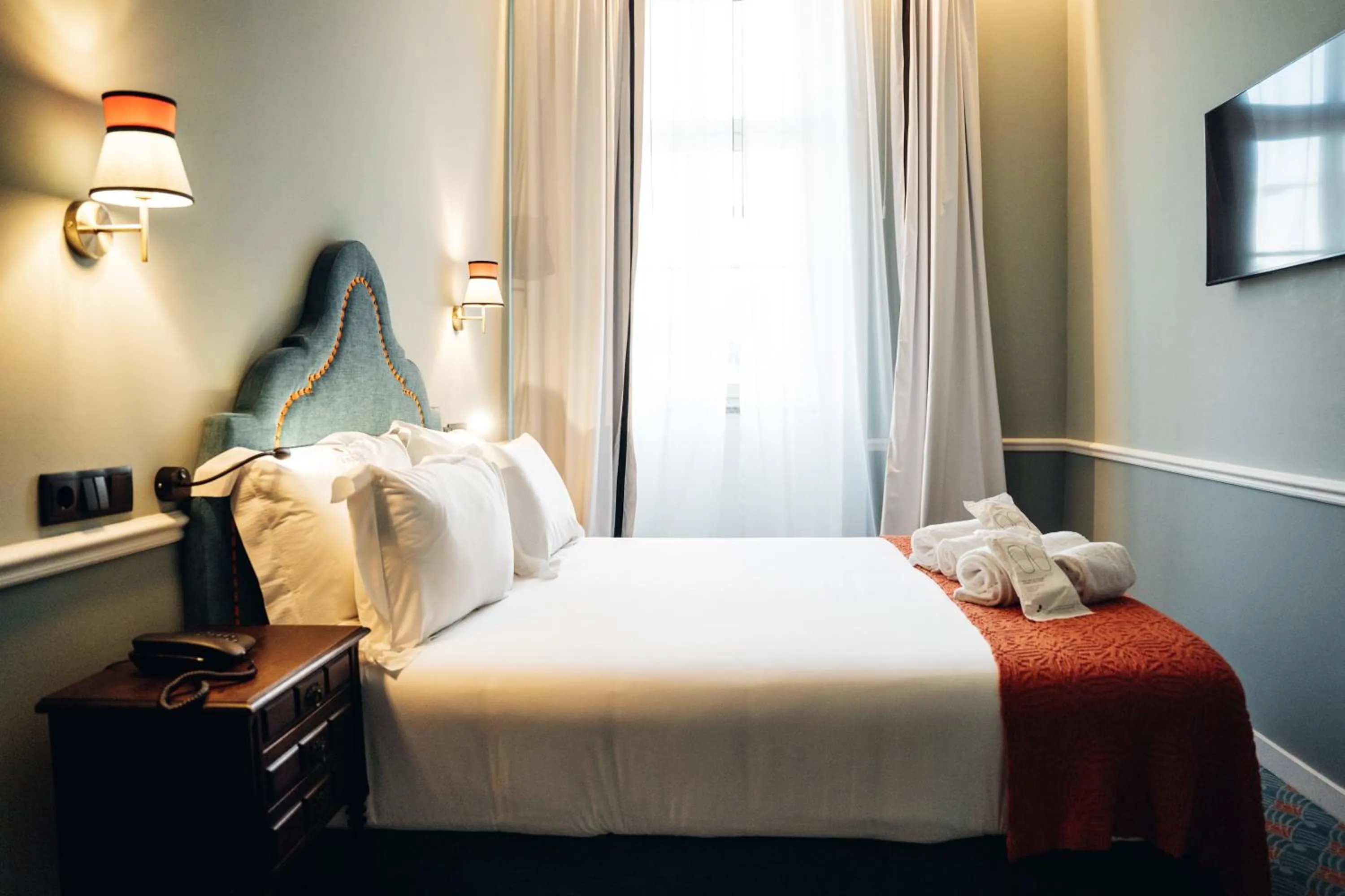 Bed in GRANDE HOTEL PARIS by STAY HOTELS