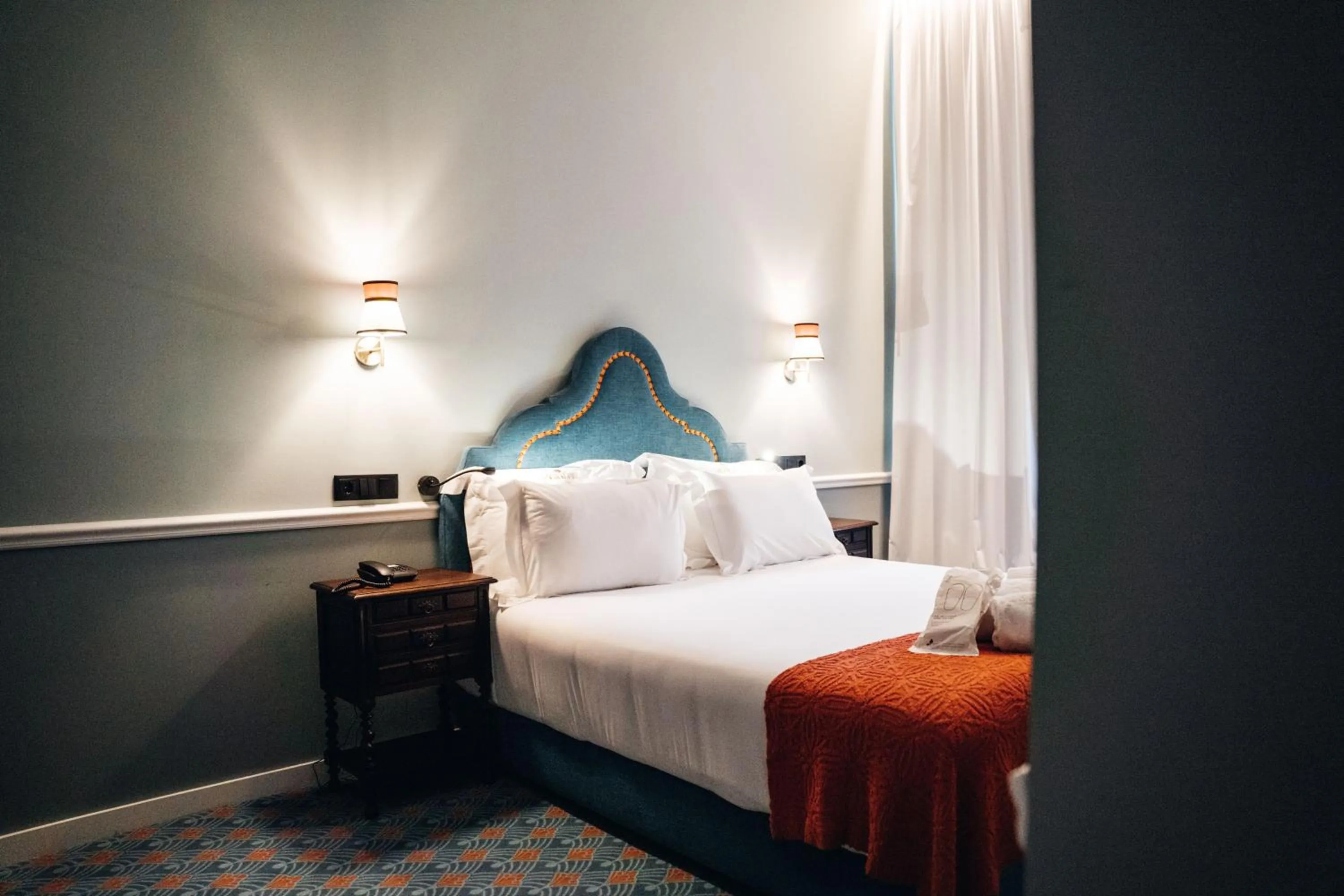 Bed in GRANDE HOTEL PARIS by STAY HOTELS