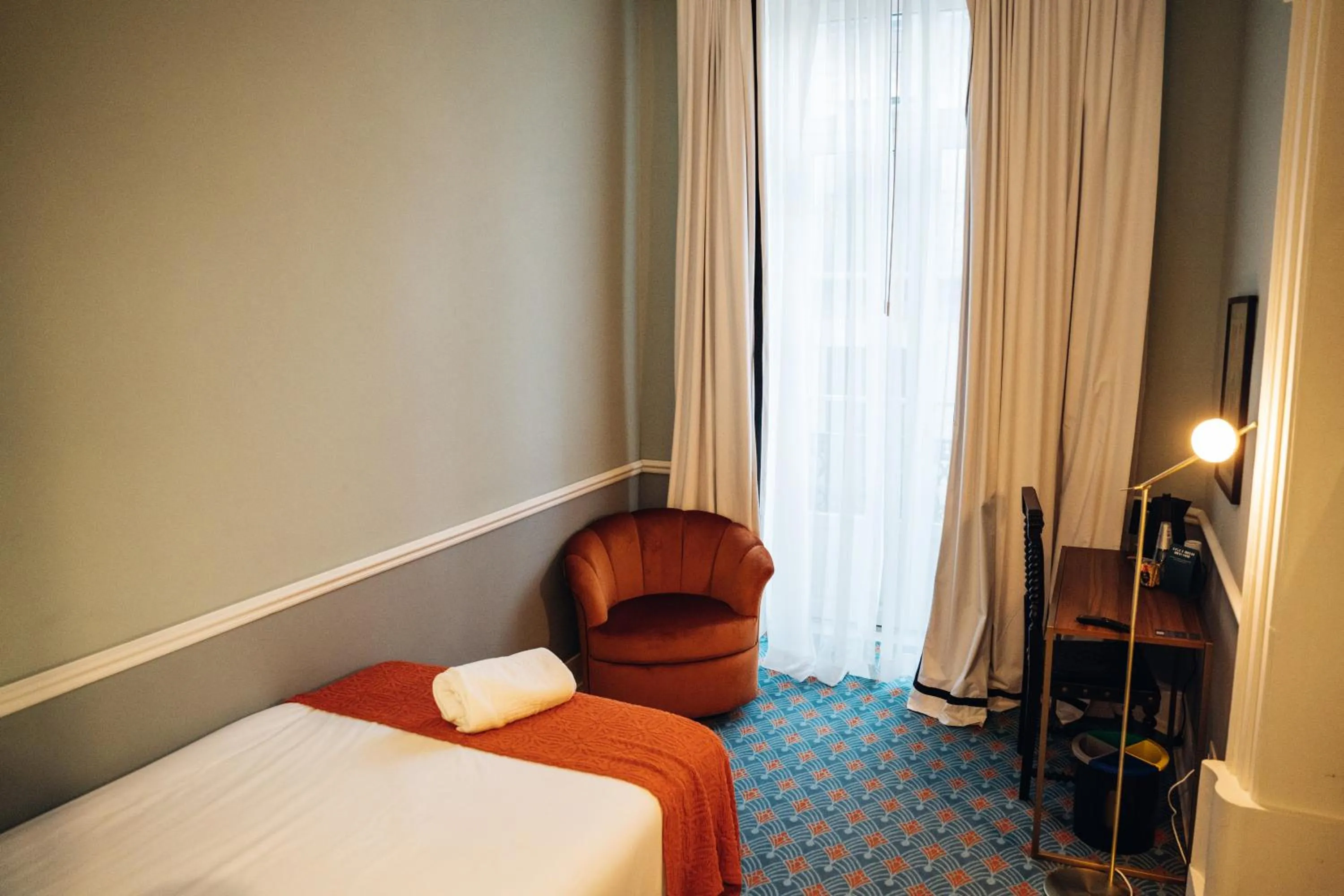 Bed in GRANDE HOTEL PARIS by STAY HOTELS