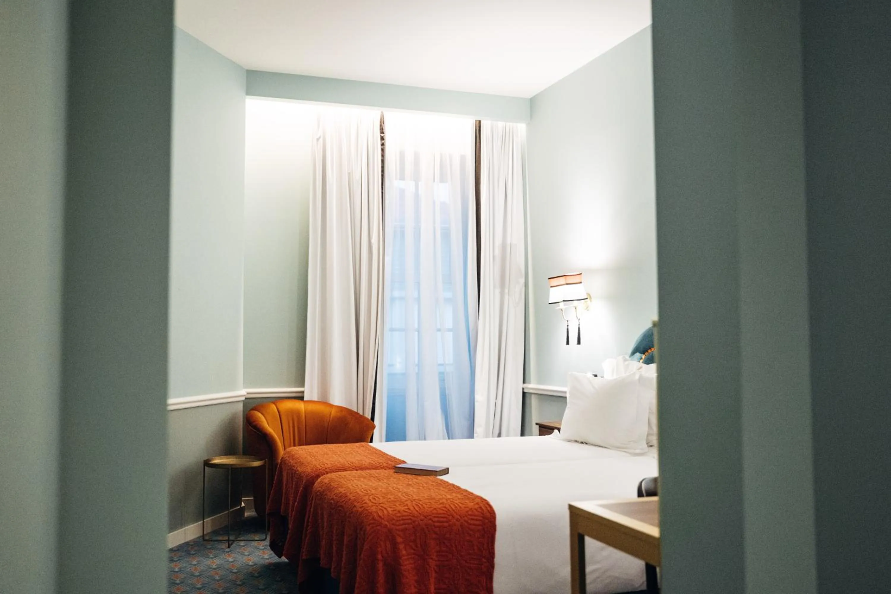 Bed in GRANDE HOTEL PARIS by STAY HOTELS