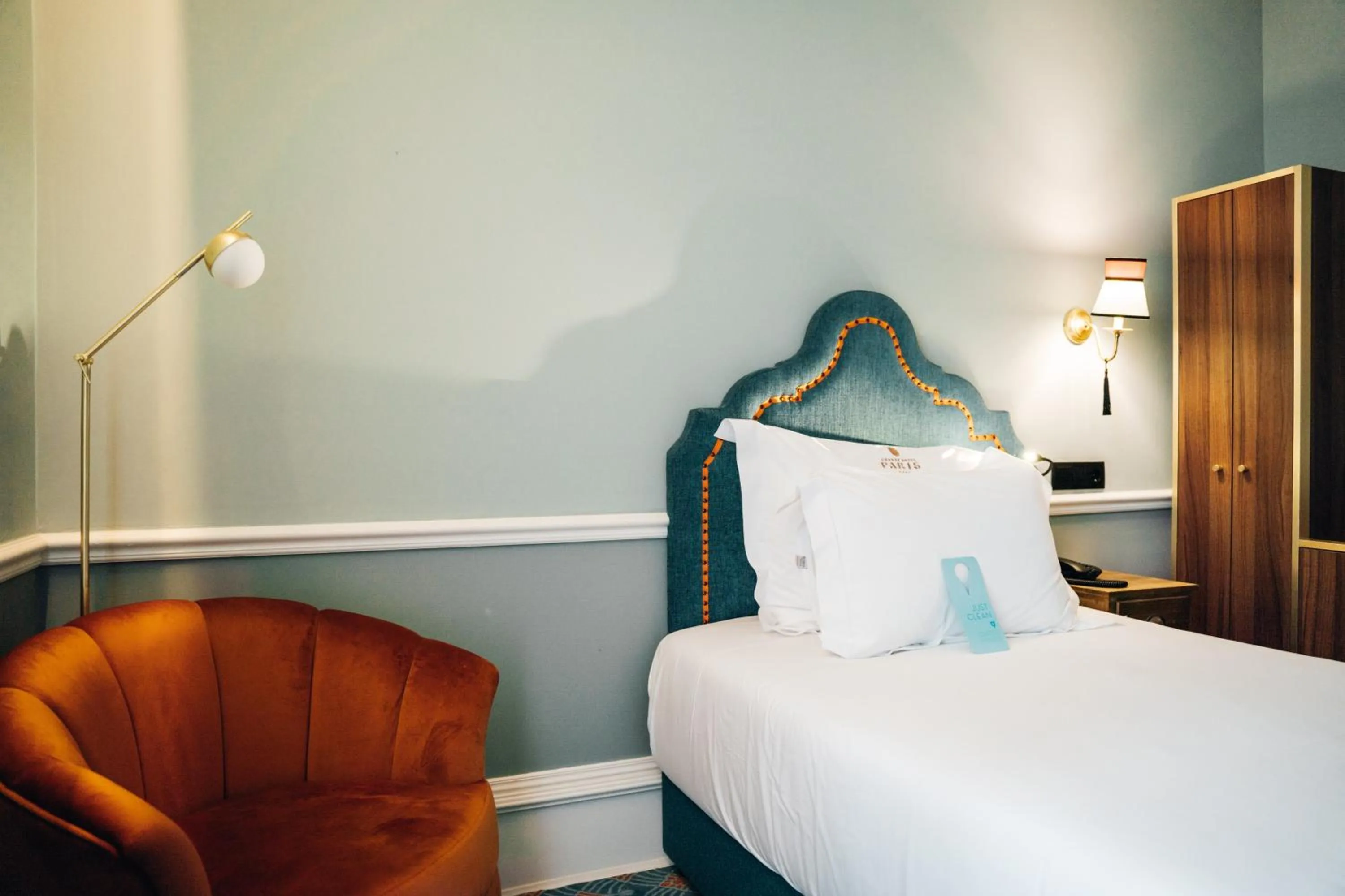 Bed in GRANDE HOTEL PARIS by STAY HOTELS