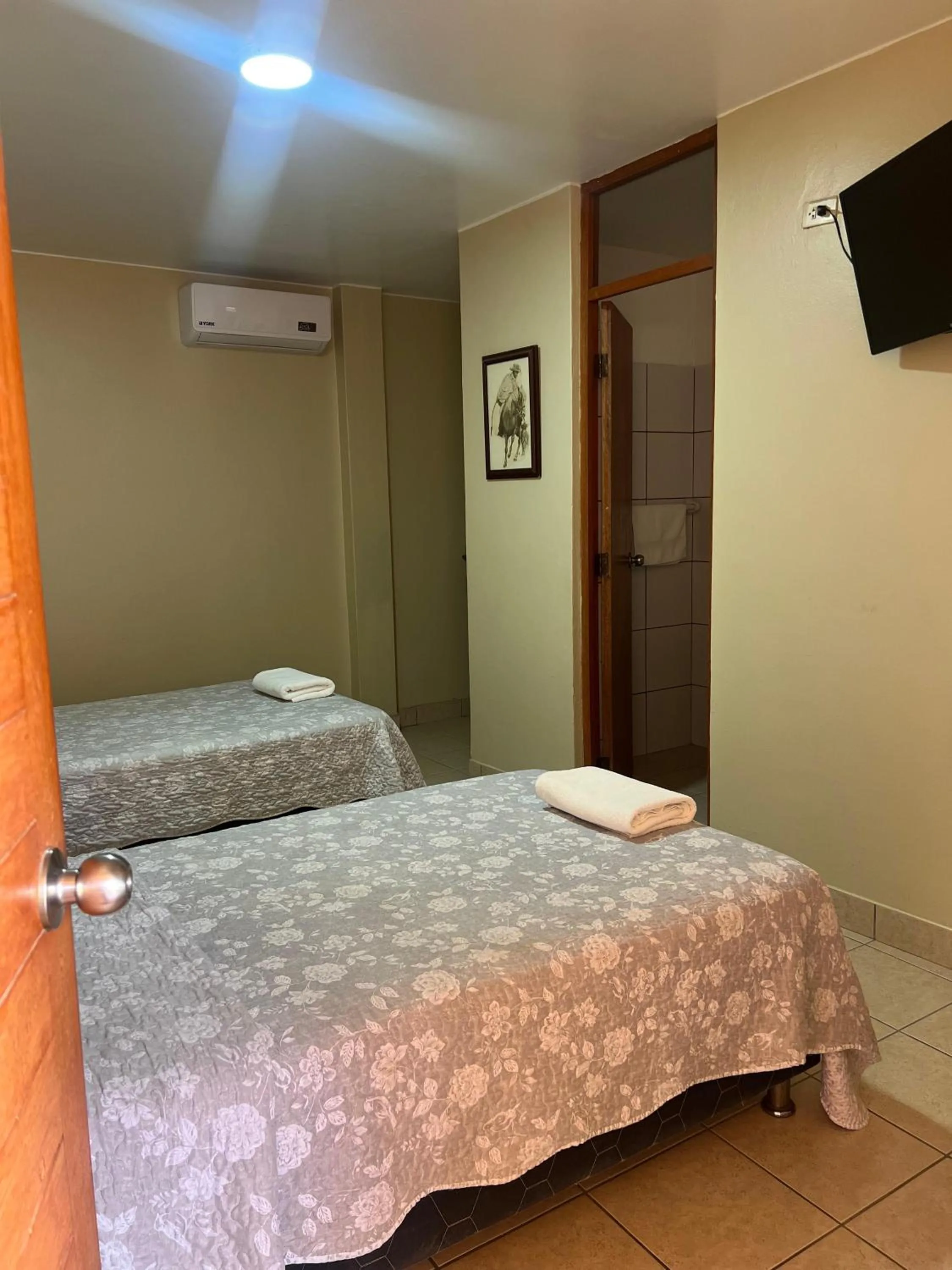 Bed in Hotel El Huacachinero- Hotel Familiar