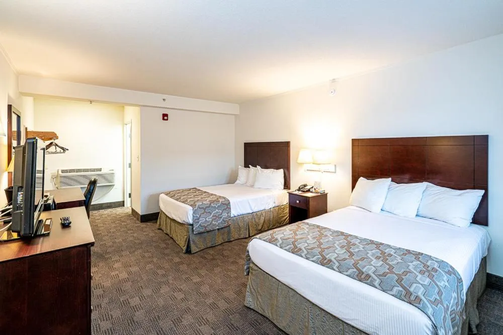 Bed in Anchorage Motel Inc.