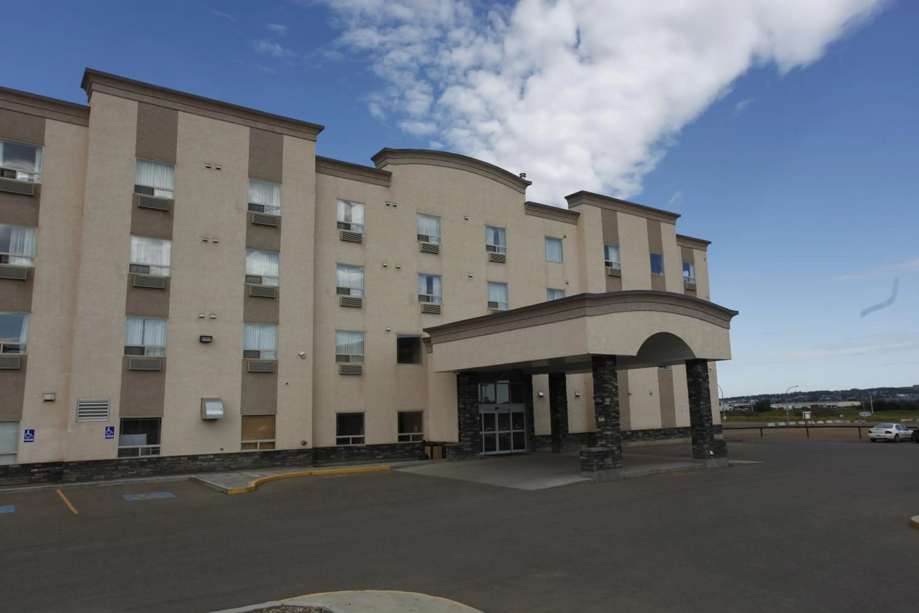 Property building in Pomeroy Inn and Suites Dawson Creek