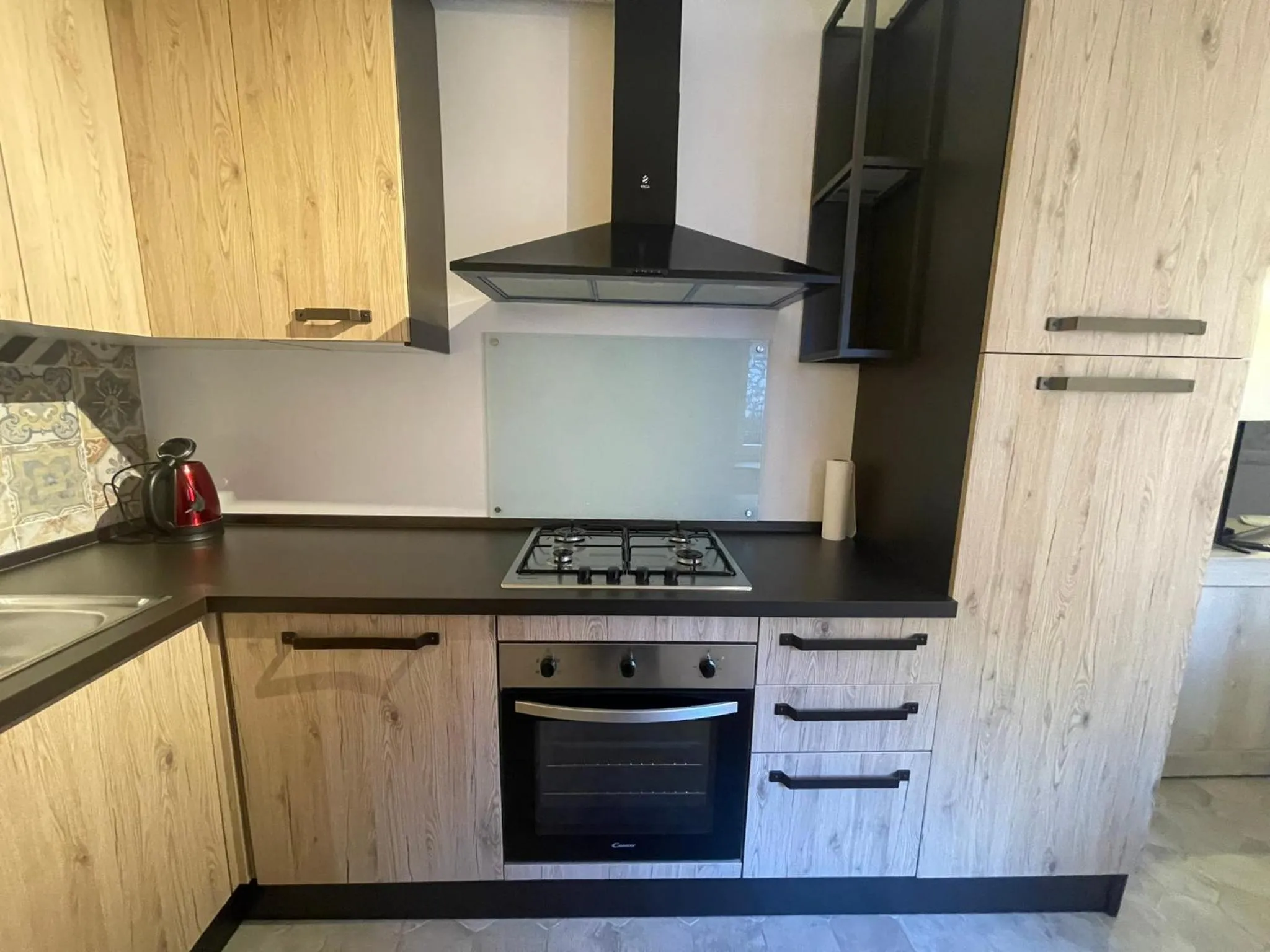 Kitchen or kitchenette in SnowLake Suite & Apartment