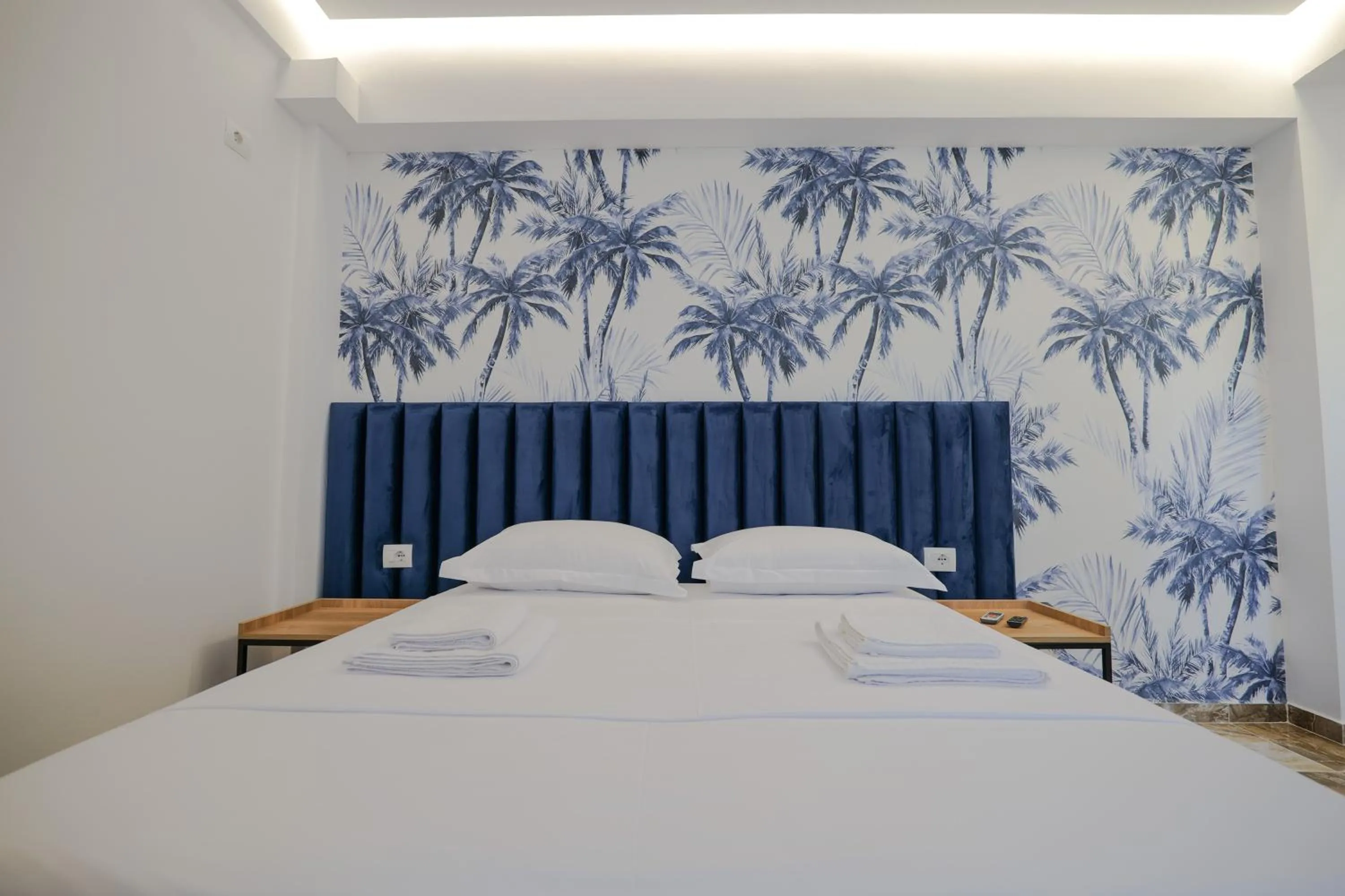 Bed in La Maison Boutique Hotel