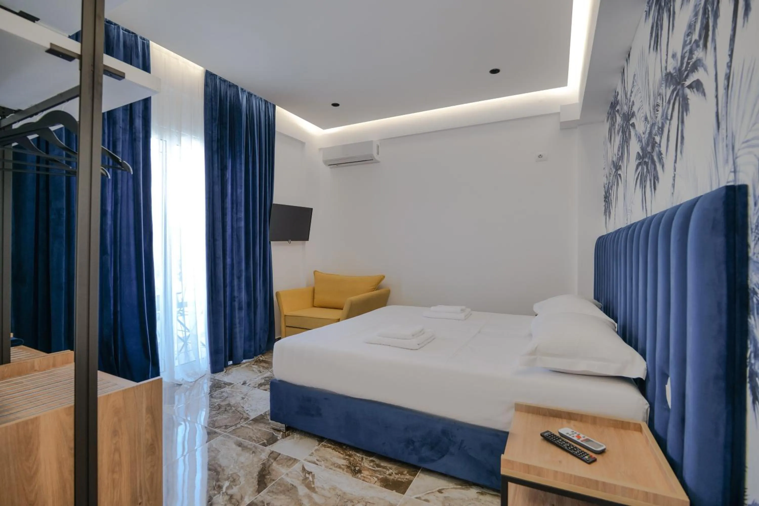 Bed in La Maison Boutique Hotel