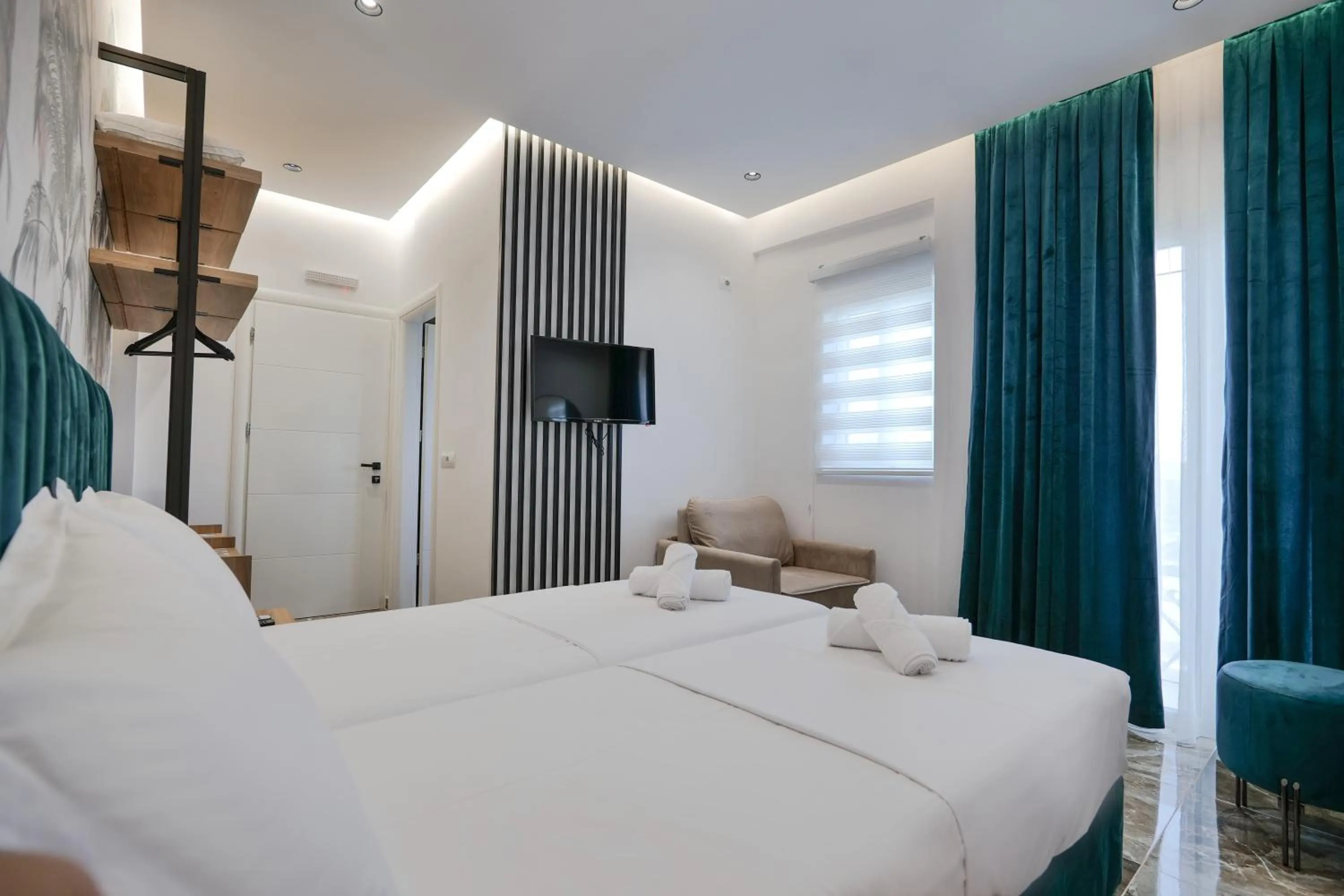 Bed in La Maison Boutique Hotel