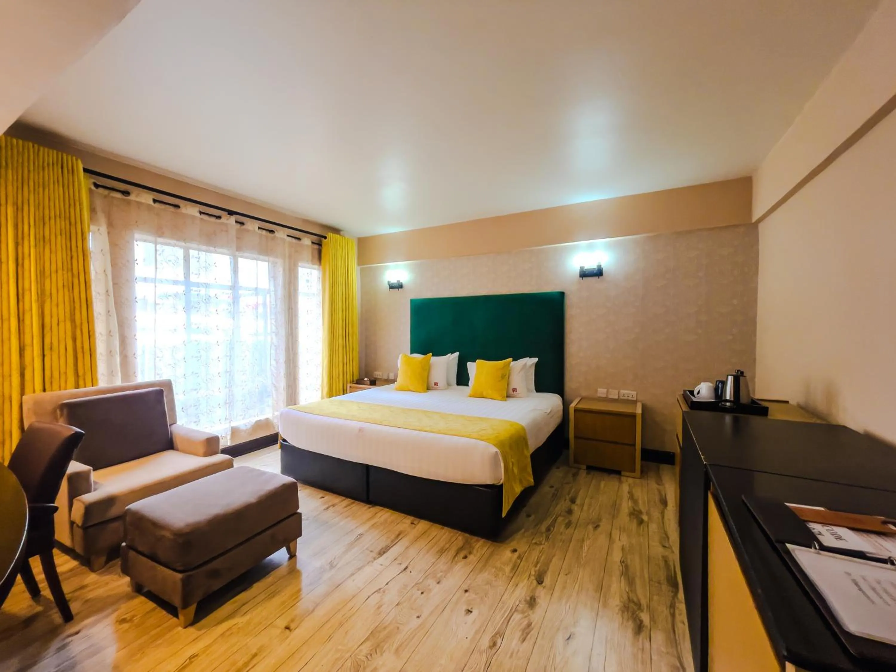 Bed in West Wood Hotel