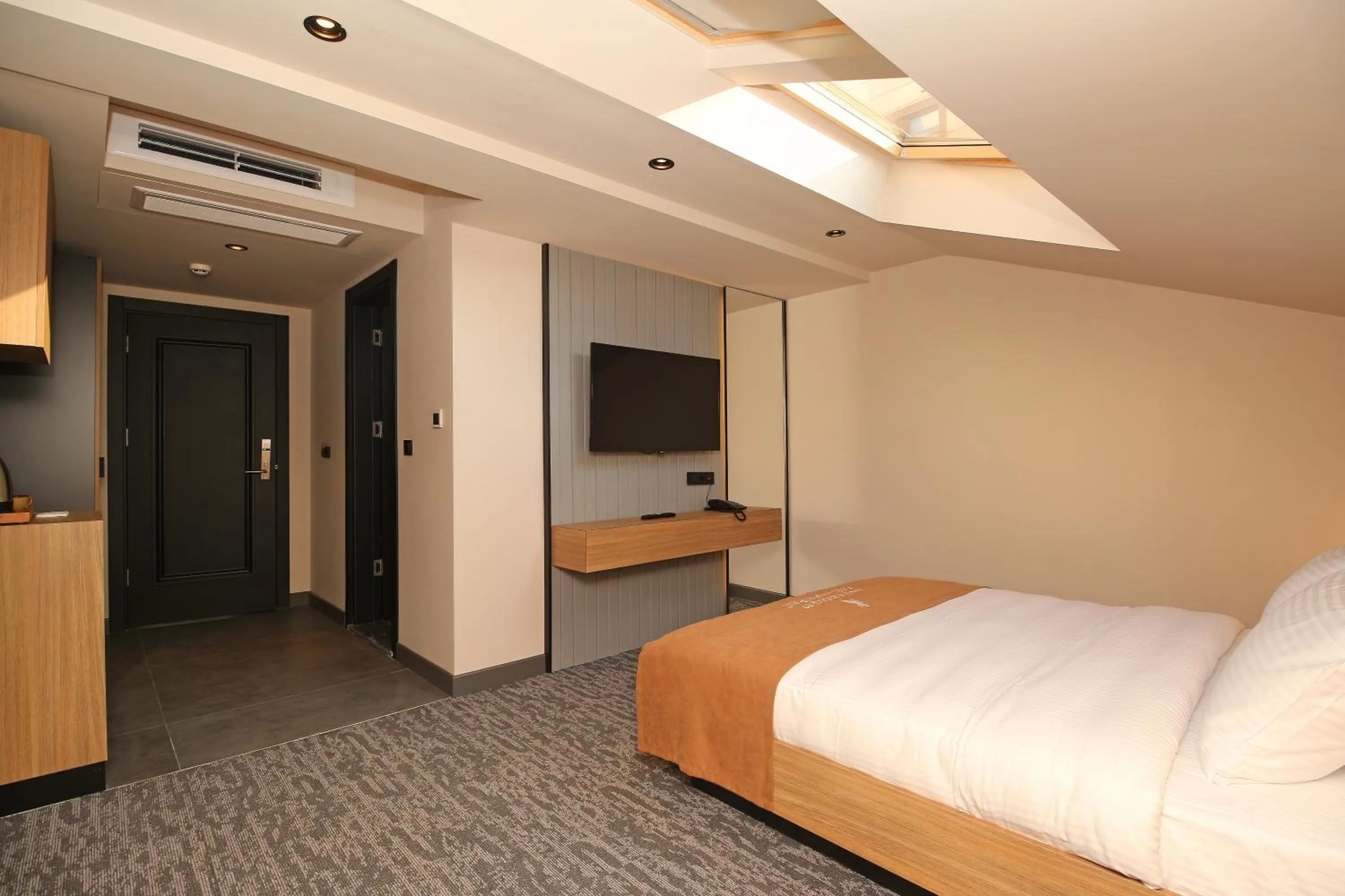 Communal lounge/ TV room, Bed in İnanlar City Hotel