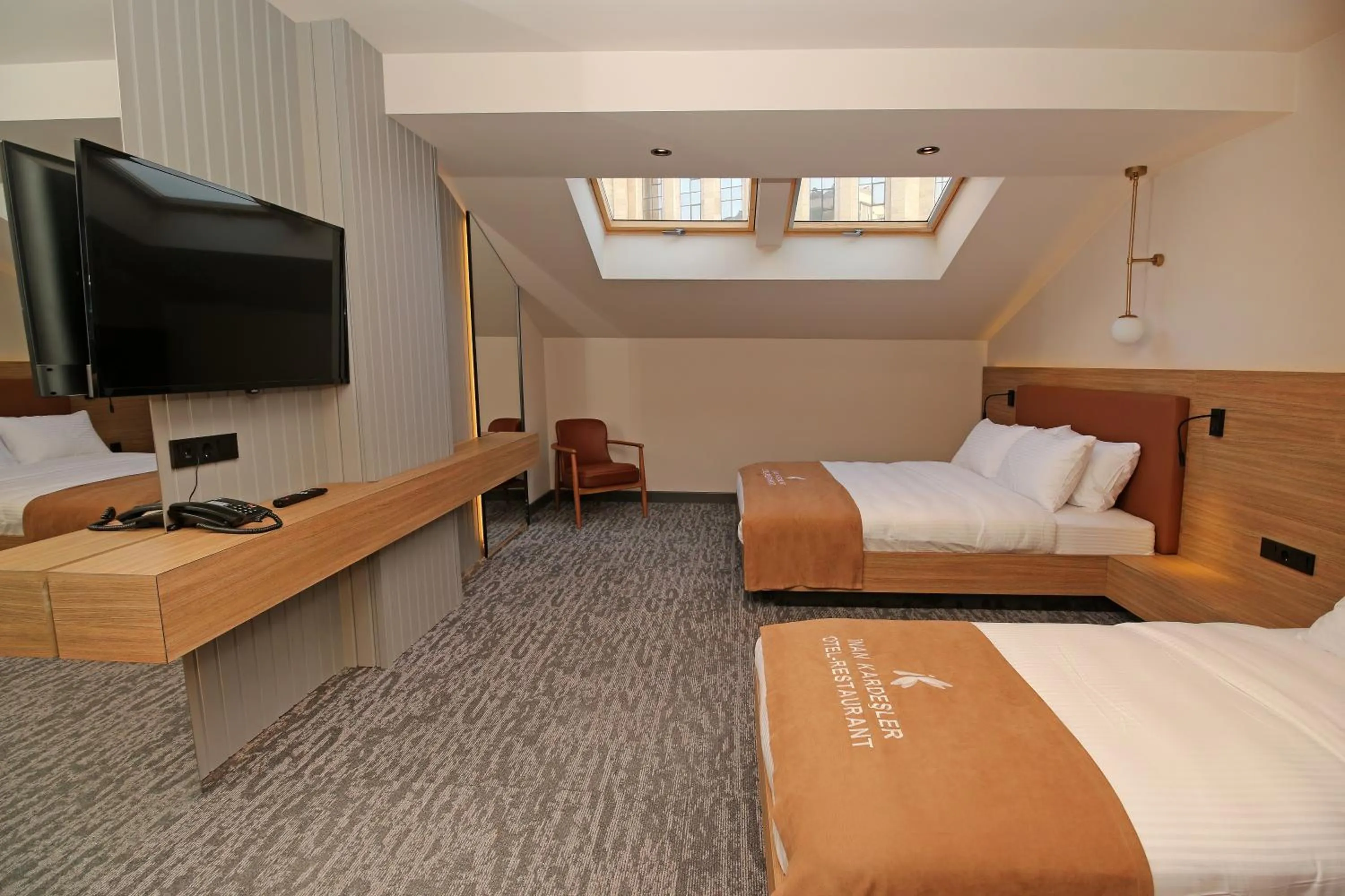 Bed in İnanlar City Hotel