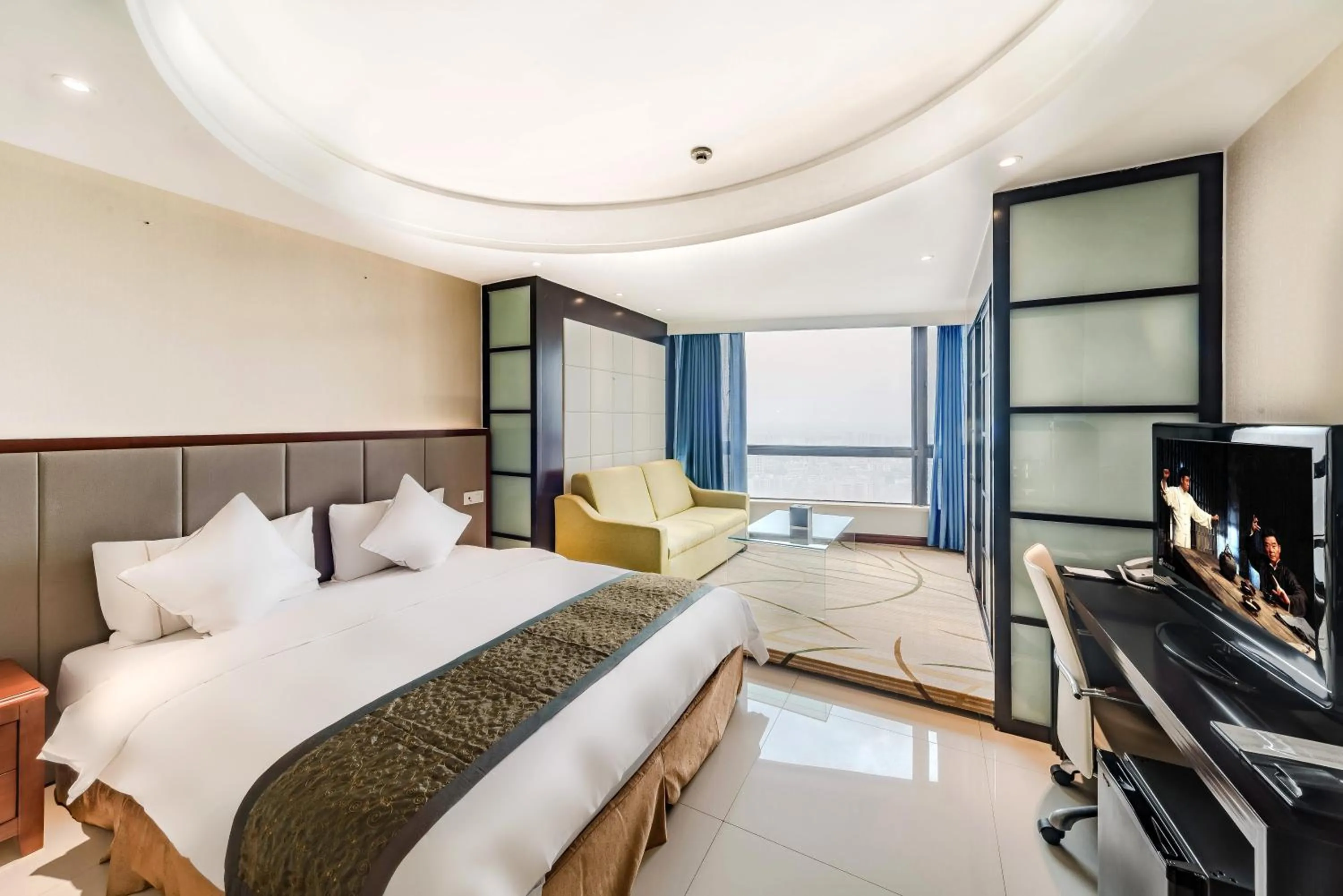 Photo of the whole room, Bed in Haikou Mingguang Shengyi Hotel (Previous Mingguang International Hotel)