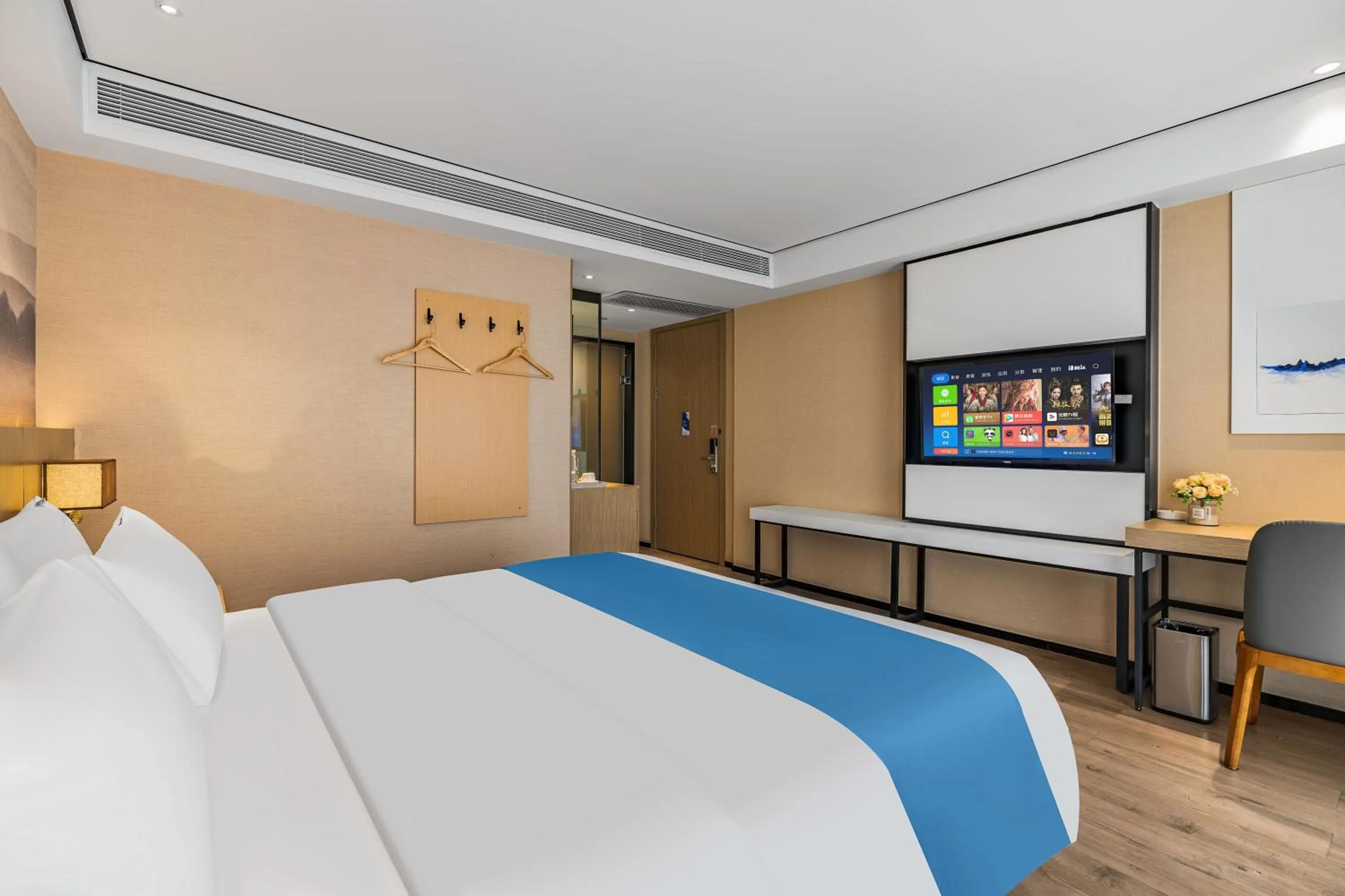 Bed in Ramada Encore by Wyndham Kunming Guandu