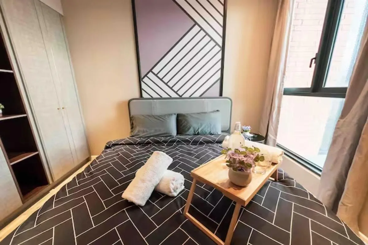 Bed in Millerz Cozy Home by GUESTONIC