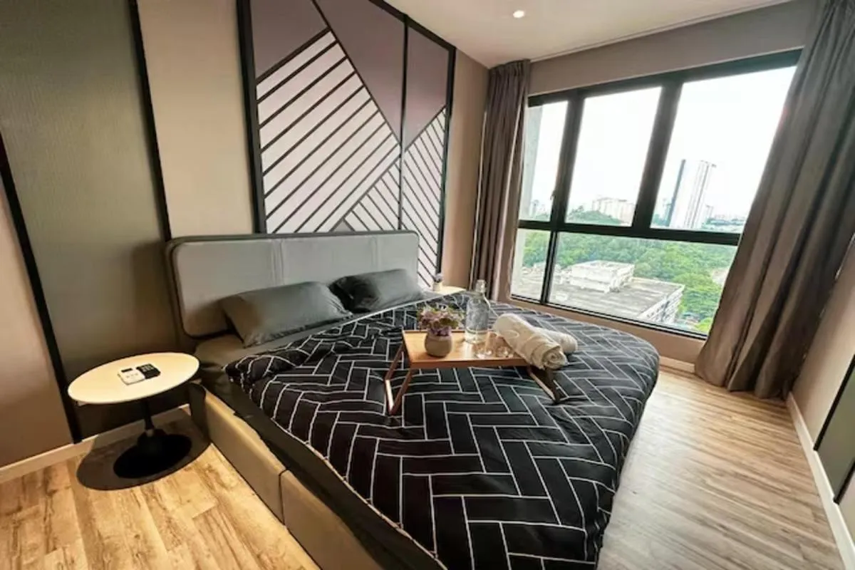 Bed in Millerz Cozy Home by GUESTONIC